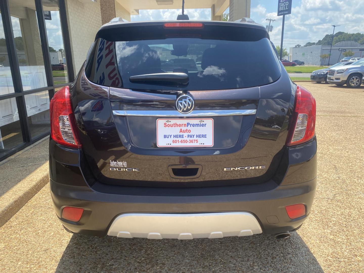 2016 BROWN BUICK ENCORE BASE (KL4CJASB9GB) , located at 922 W. Beacon St., Philadelphia, MS, 39350, (601) 650-3675, 32.770447, -89.127151 - Photo#4