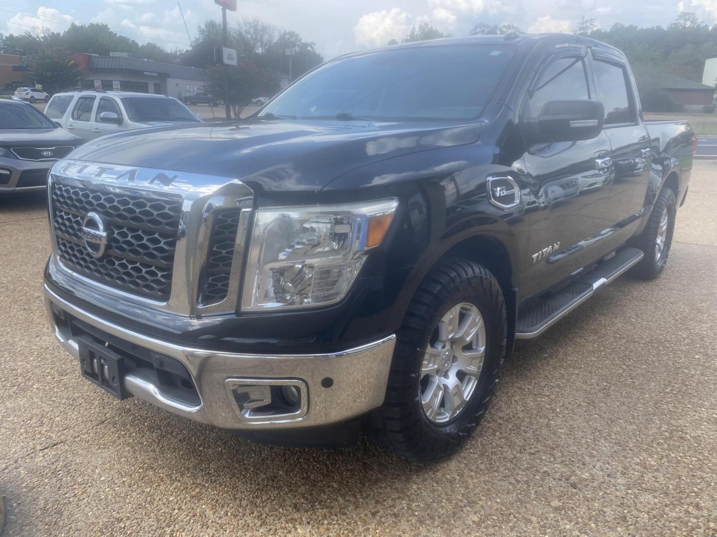 2017 BLACK NISSAN TITAN SV (1N6AA1E65HN) , located at 922 W. Beacon St., Philadelphia, MS, 39350, (601) 650-3675, 32.770447, -89.127151 - Photo#2