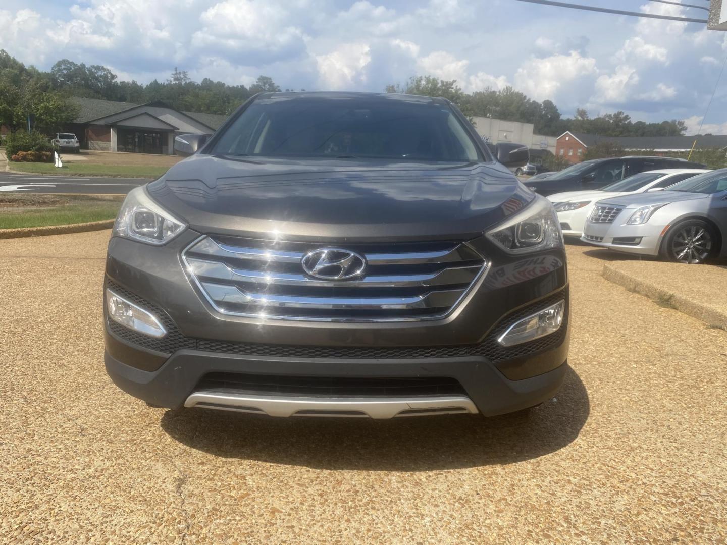 2013 BROWN HYUNDAI SANTA FE SPORT (5XYZU3LB3DG) , located at 922 W. Beacon St., Philadelphia, MS, 39350, (601) 650-3675, 32.770447, -89.127151 - Photo#1