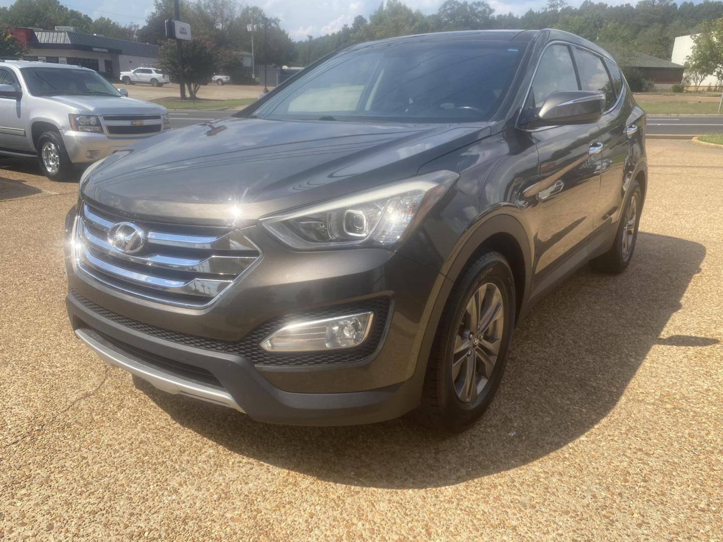 2013 BROWN HYUNDAI SANTA FE SPORT (5XYZU3LB3DG) , located at 922 W. Beacon St., Philadelphia, MS, 39350, (601) 650-3675, 32.770447, -89.127151 - Photo#2