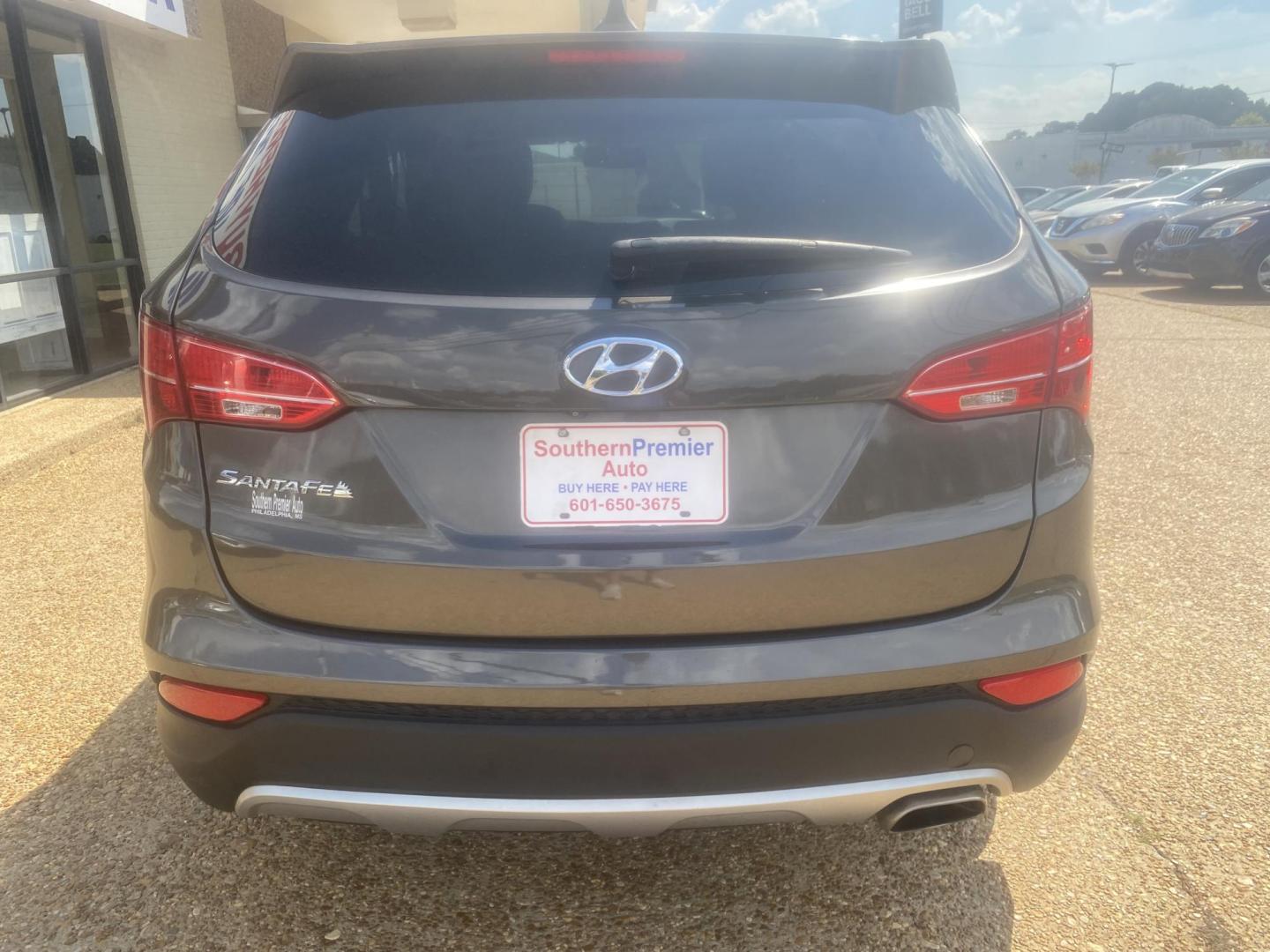 2013 BROWN HYUNDAI SANTA FE SPORT (5XYZU3LB3DG) , located at 922 W. Beacon St., Philadelphia, MS, 39350, (601) 650-3675, 32.770447, -89.127151 - Photo#4