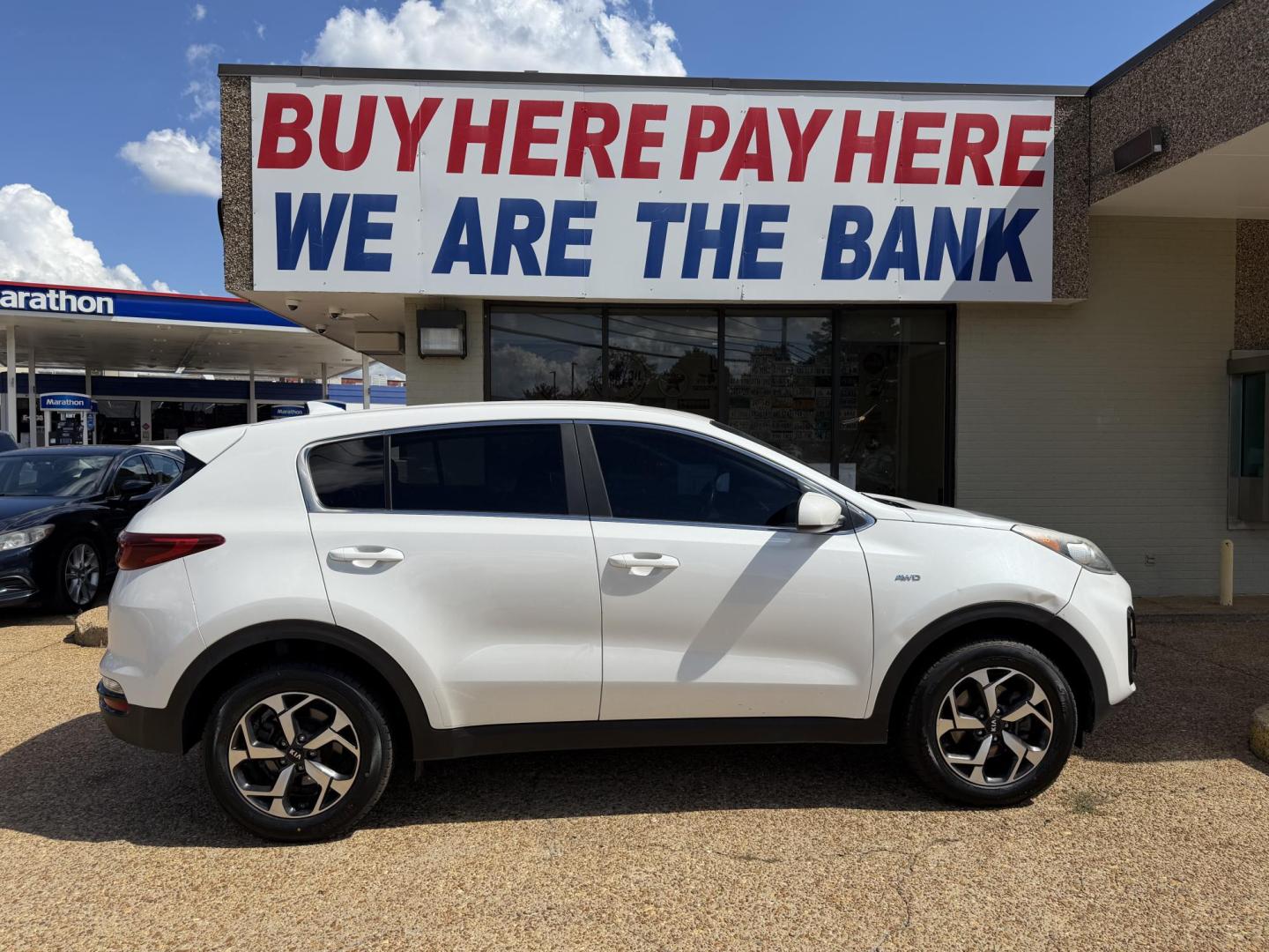 2021 WHITE KIA SPORTAGE LX (KNDPMCAC0M7) , located at 922 W. Beacon St., Philadelphia, MS, 39350, (601) 650-3675, 32.770447, -89.127151 - Photo#6