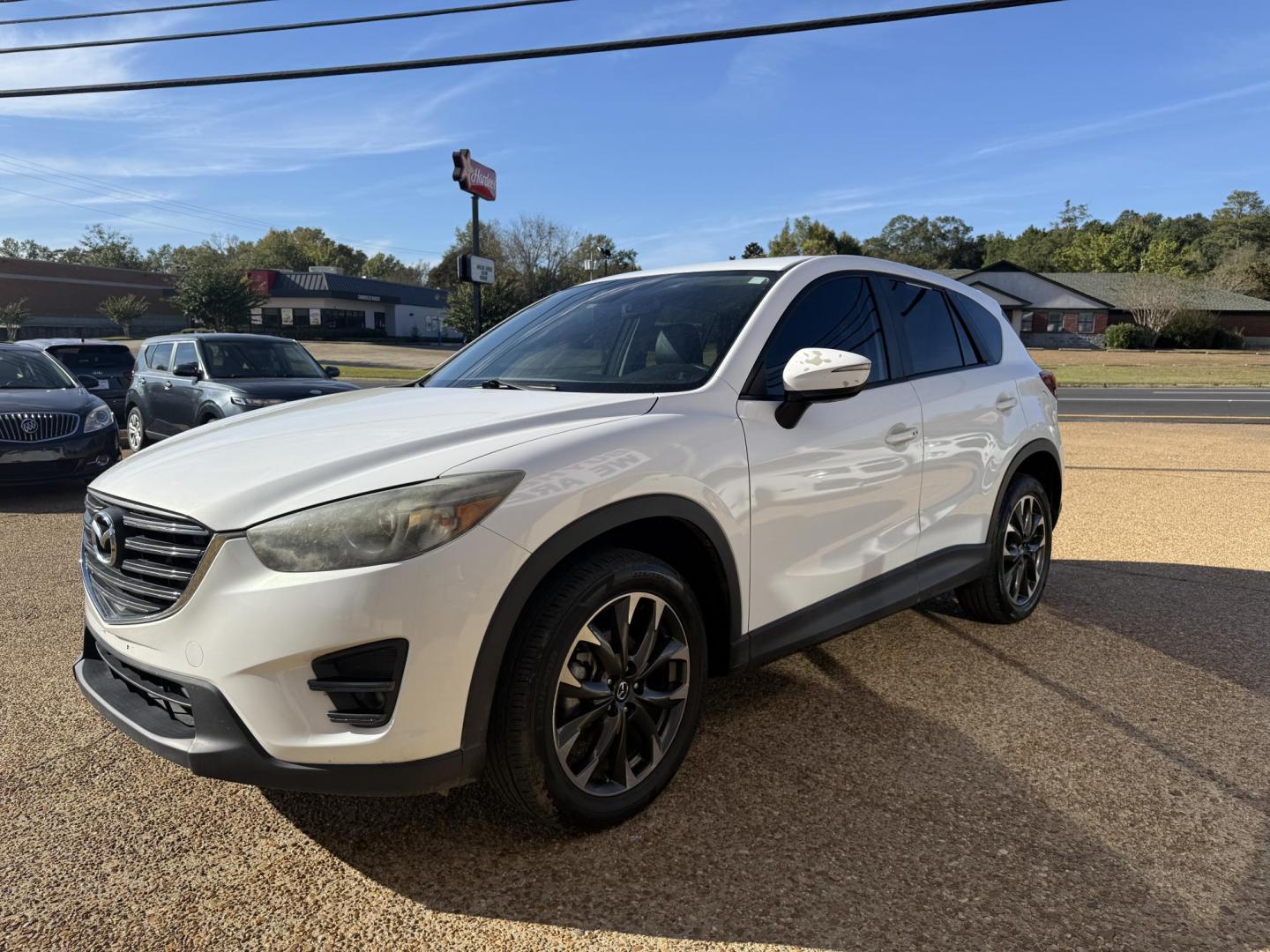 2016 WHITE MAZDA CX-5 GRAND TOURING (JM3KE4DY4G0) , located at 922 W. Beacon St., Philadelphia, MS, 39350, (601) 650-3675, 32.770447, -89.127151 - Photo#2