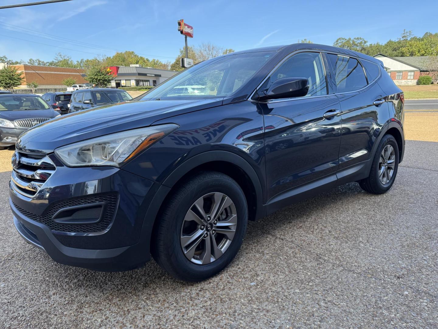 2016 BLUE HYUNDAI SANTA FE SPORT (5XYZT3LB8GG) , located at 922 W. Beacon St., Philadelphia, MS, 39350, (601) 650-3675, 32.770447, -89.127151 - Photo#2