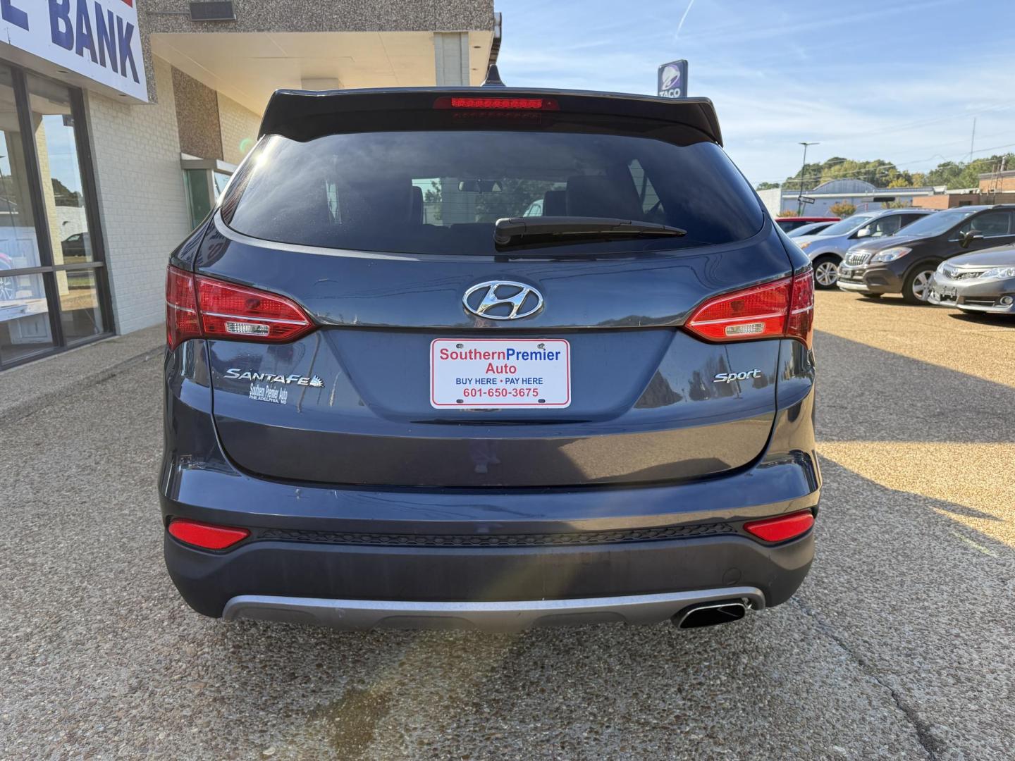 2016 BLUE HYUNDAI SANTA FE SPORT (5XYZT3LB8GG) , located at 922 W. Beacon St., Philadelphia, MS, 39350, (601) 650-3675, 32.770447, -89.127151 - Photo#4