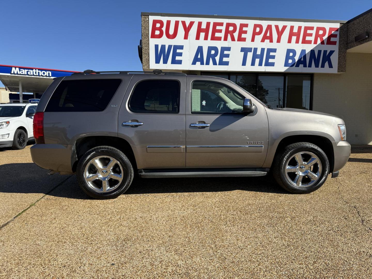 2013 BROWN CHEVROLET TAHOE LTZ (1GNSCCE05DR) , located at 922 W. Beacon St., Philadelphia, MS, 39350, (601) 650-3675, 32.770447, -89.127151 - Photo#7