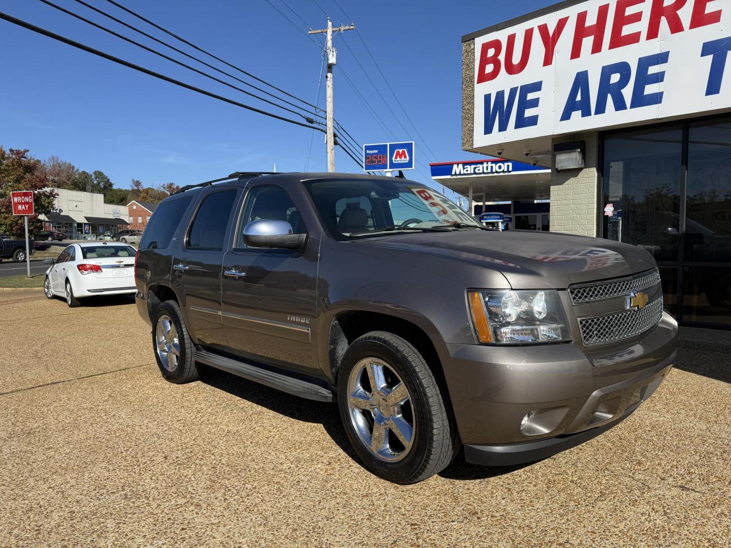 2013 BROWN CHEVROLET TAHOE LTZ (1GNSCCE05DR) , located at 922 W. Beacon St., Philadelphia, MS, 39350, (601) 650-3675, 32.770447, -89.127151 - Photo#0
