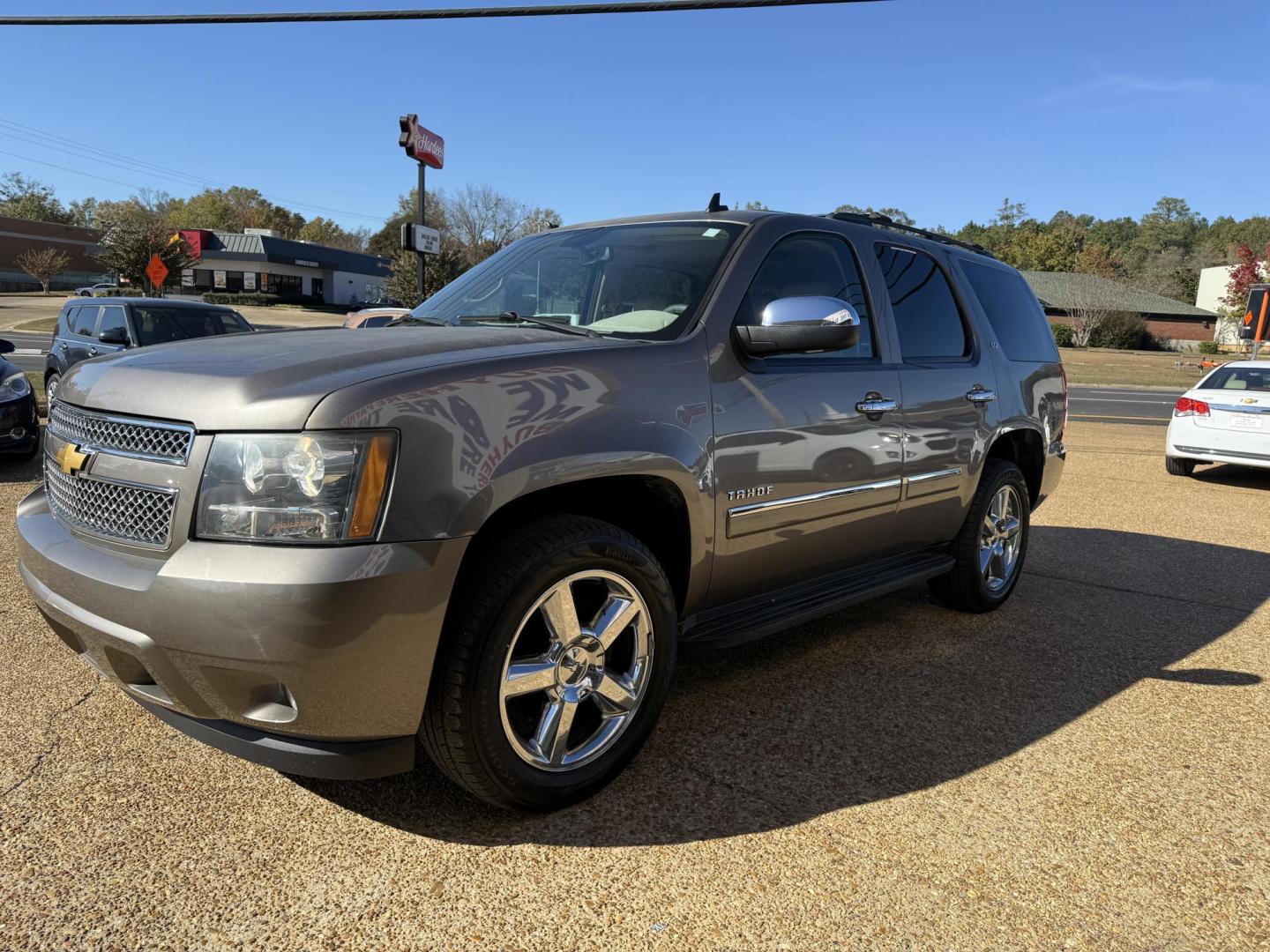 2013 BROWN CHEVROLET TAHOE LTZ (1GNSCCE05DR) , located at 922 W. Beacon St., Philadelphia, MS, 39350, (601) 650-3675, 32.770447, -89.127151 - Photo#2