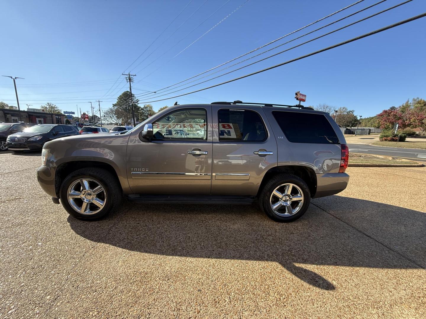 2013 BROWN CHEVROLET TAHOE LTZ (1GNSCCE05DR) , located at 922 W. Beacon St., Philadelphia, MS, 39350, (601) 650-3675, 32.770447, -89.127151 - Photo#3