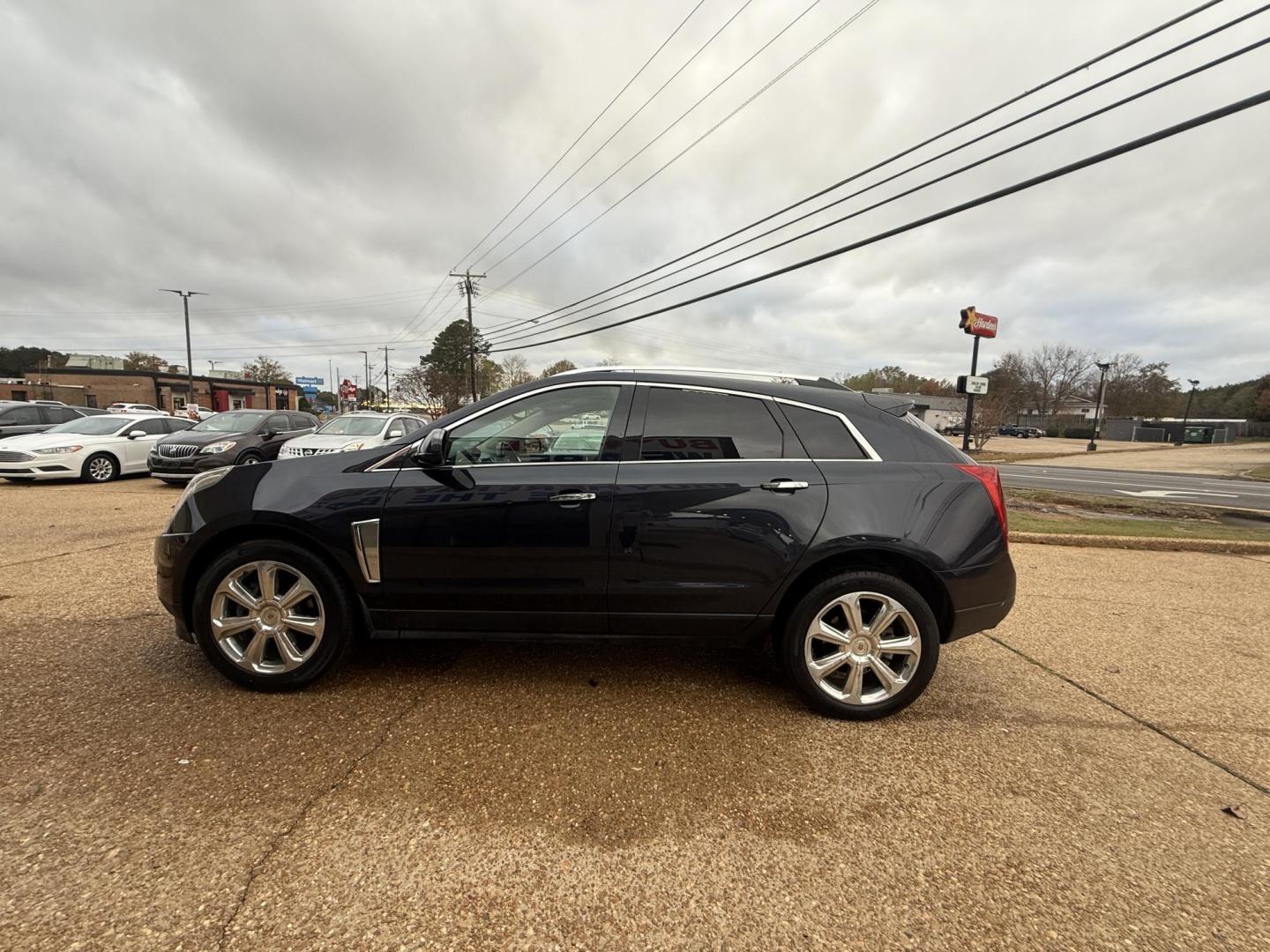2015 BLUE CADILLAC SRX PREMIUM (3GYFNGE37FS) , located at 922 W. Beacon St., Philadelphia, MS, 39350, (601) 650-3675, 32.770447, -89.127151 - Photo#3