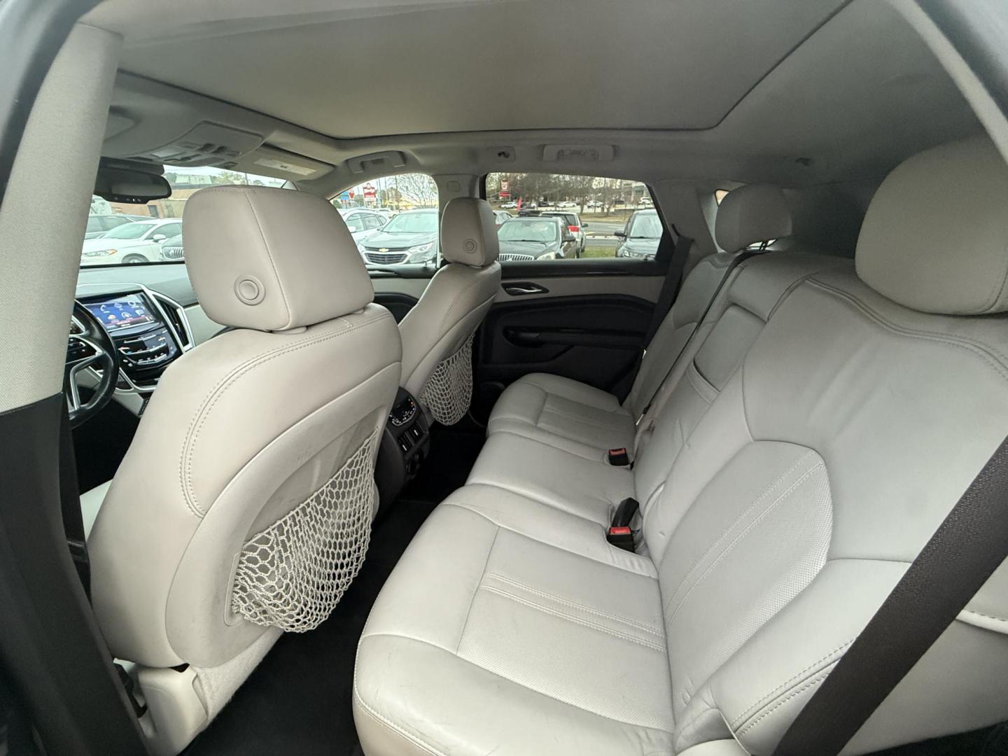 2015 BLUE CADILLAC SRX PREMIUM (3GYFNGE37FS) , located at 922 W. Beacon St., Philadelphia, MS, 39350, (601) 650-3675, 32.770447, -89.127151 - Photo#12