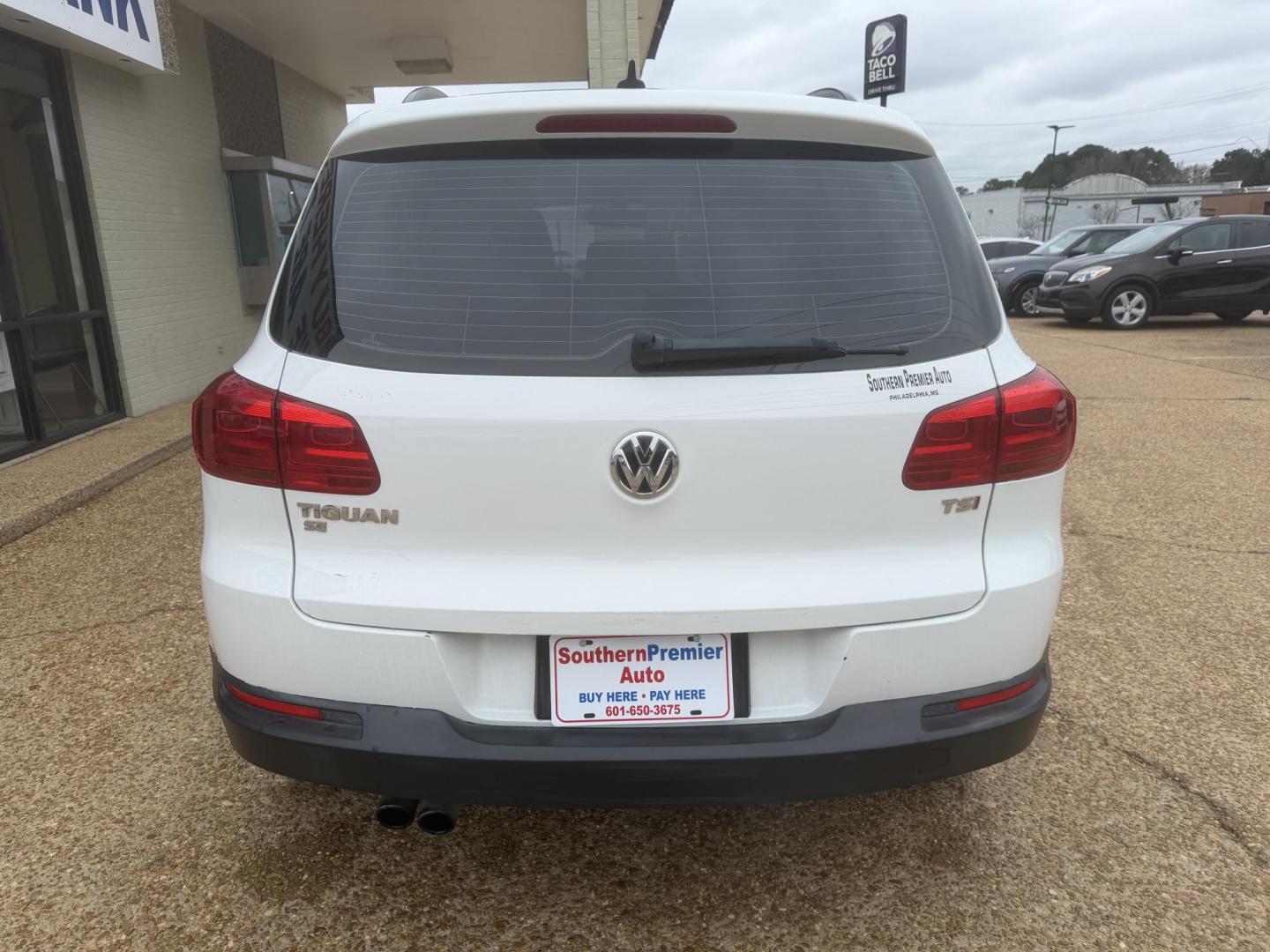 2017 WHITE VOLKSWAGEN TIGUAN S (WVGAV7AX4HK) , located at 922 W. Beacon St., Philadelphia, MS, 39350, (601) 650-3675, 32.770447, -89.127151 - Photo#4