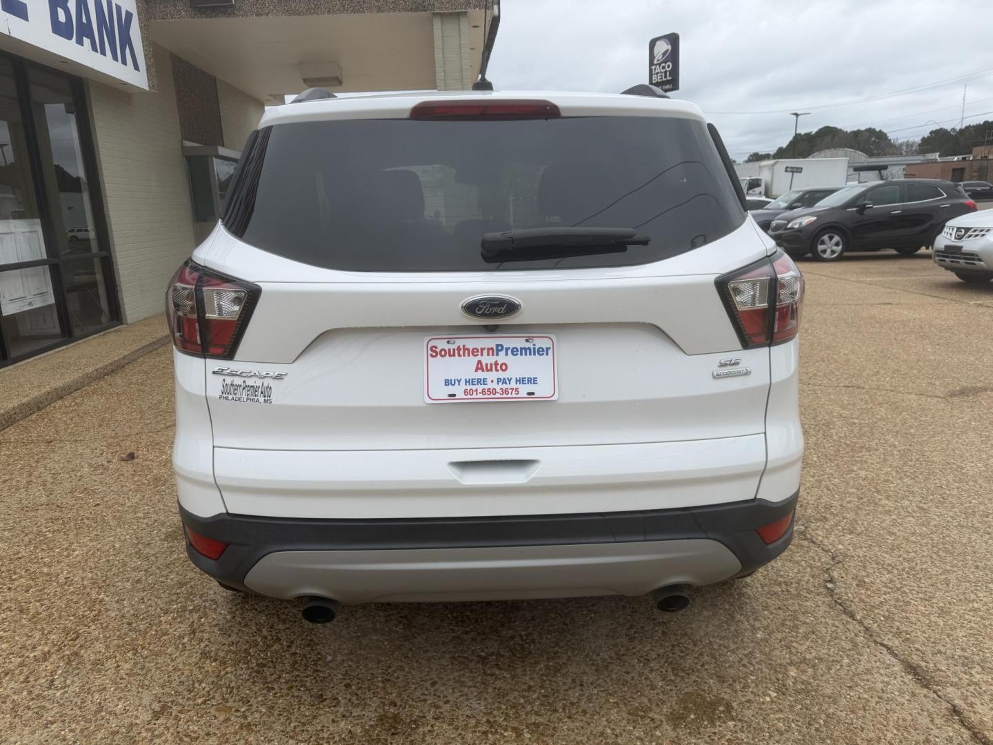 2018 WHITE FORD ESCAPE (1FMCU0GD2JU) , located at 922 W. Beacon St., Philadelphia, MS, 39350, (601) 650-3675, 32.770447, -89.127151 - Photo#4