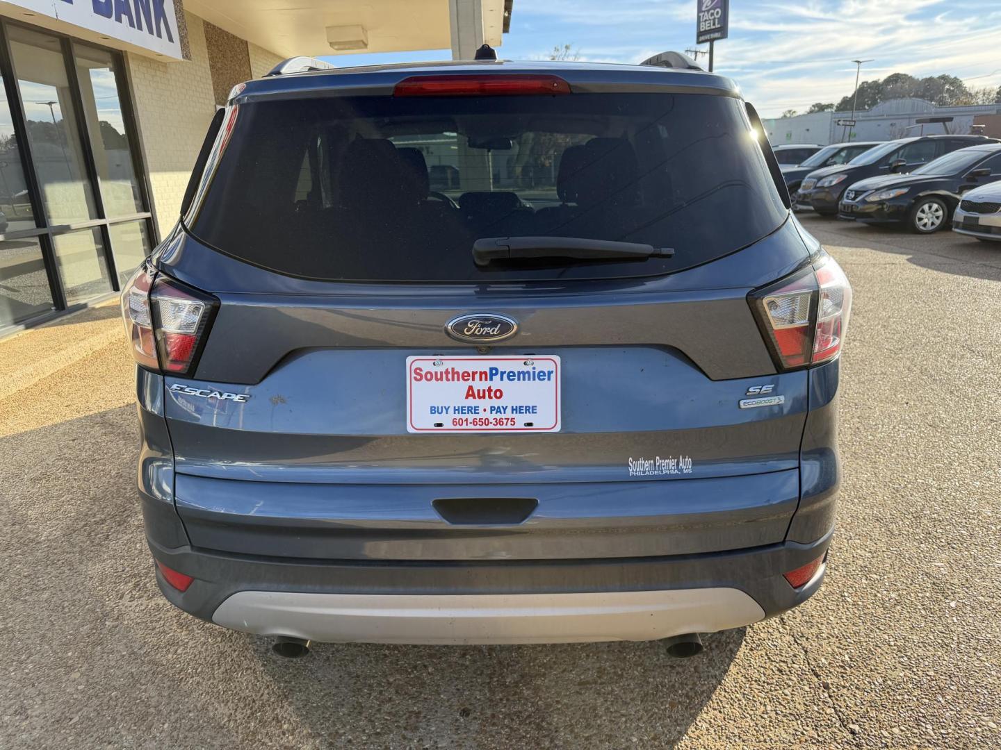 2018 BLUE FORD ESCAPE SE (1FMCU0GD3JU) , located at 922 W. Beacon St., Philadelphia, MS, 39350, (601) 650-3675, 32.770447, -89.127151 - Photo#4