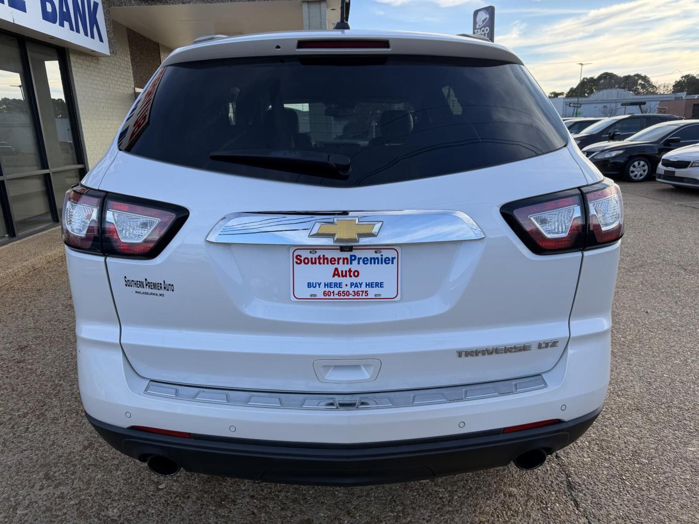 2016 WHITE CHEVROLET TRAVERSE LTZ (1GNKRJKD1GJ) , located at 922 W. Beacon St., Philadelphia, MS, 39350, (601) 650-3675, 32.770447, -89.127151 - Photo#4