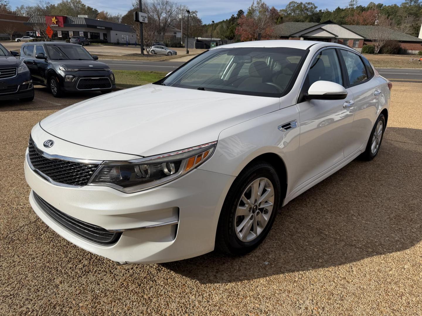 2016 WHITE KIA OPTIMA LX (5XXGT4L32GG) , located at 922 W. Beacon St., Philadelphia, MS, 39350, (601) 650-3675, 32.770447, -89.127151 - Photo#2