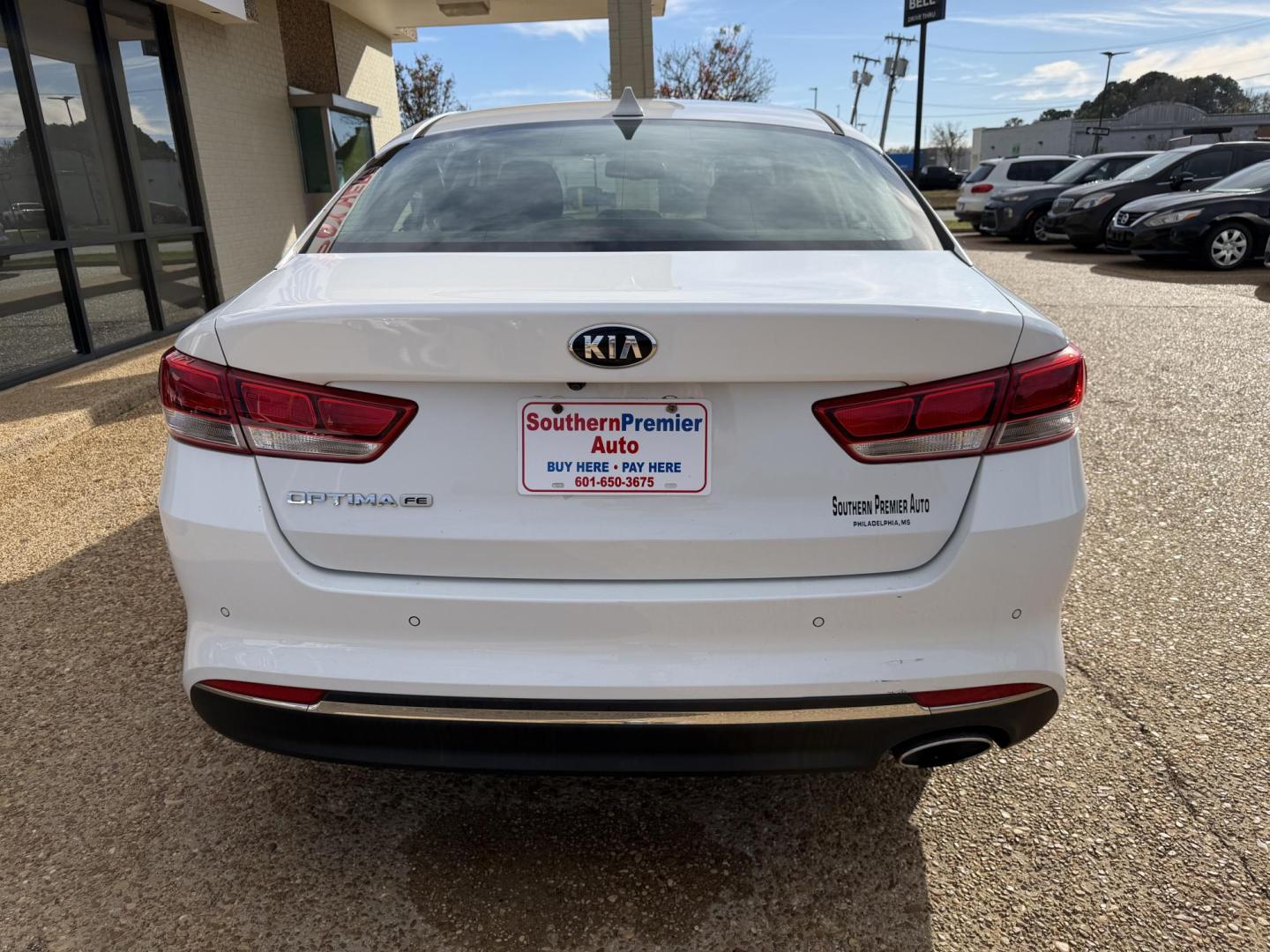 2016 WHITE KIA OPTIMA LX (5XXGT4L32GG) , located at 922 W. Beacon St., Philadelphia, MS, 39350, (601) 650-3675, 32.770447, -89.127151 - Photo#4