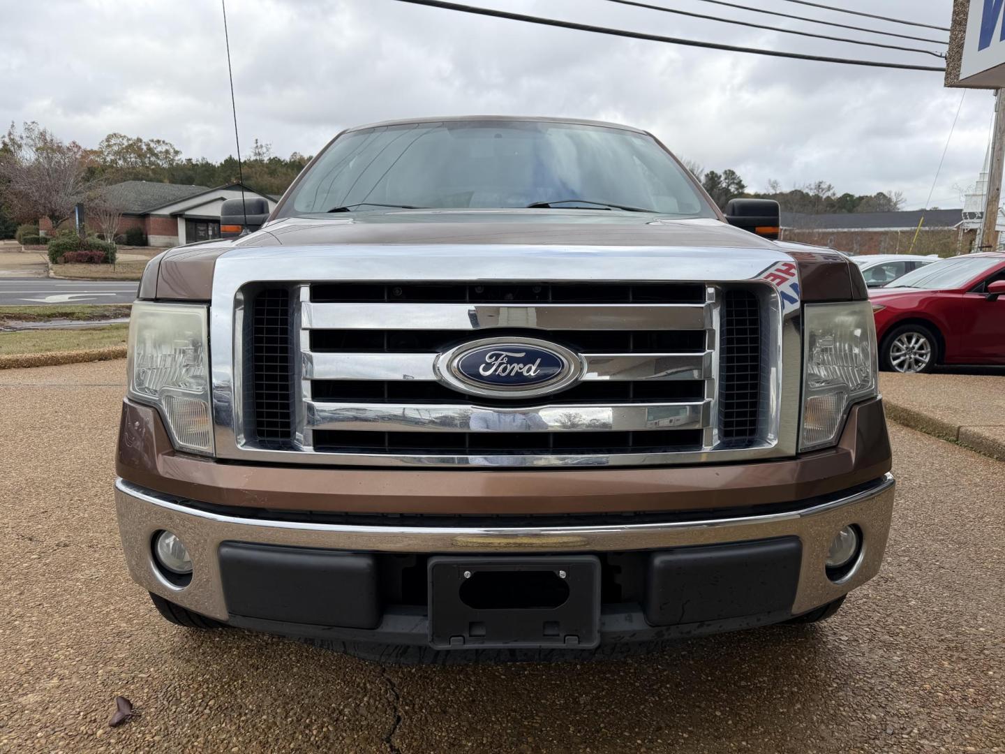 2011 GOLD FORD F-150 XLT (1FTEW1CMXBK) , located at 922 W. Beacon St., Philadelphia, MS, 39350, (601) 650-3675, 32.770447, -89.127151 - Photo#1
