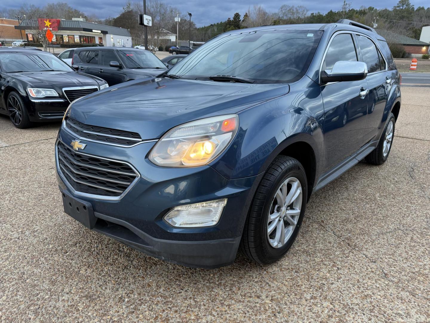 2016 BLUE CHEVROLET EQUINOX LT (2GNALCEK4G6) , located at 922 W. Beacon St., Philadelphia, MS, 39350, (601) 650-3675, 32.770447, -89.127151 - Photo#2