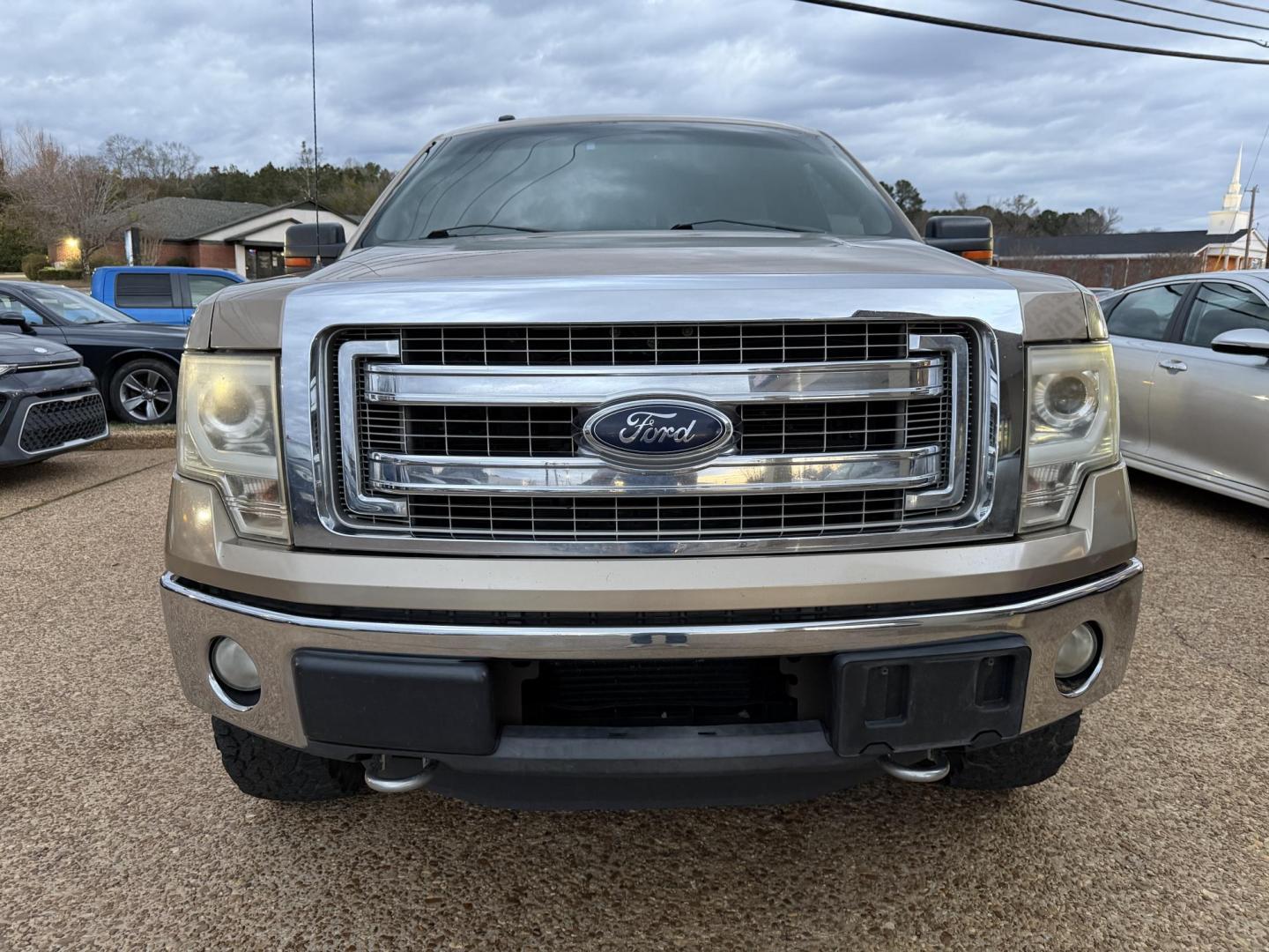 2013 TAN FORD F-150 XLT (1FTFW1ET7DK) , located at 922 W. Beacon St., Philadelphia, MS, 39350, (601) 650-3675, 32.770447, -89.127151 - Photo#1