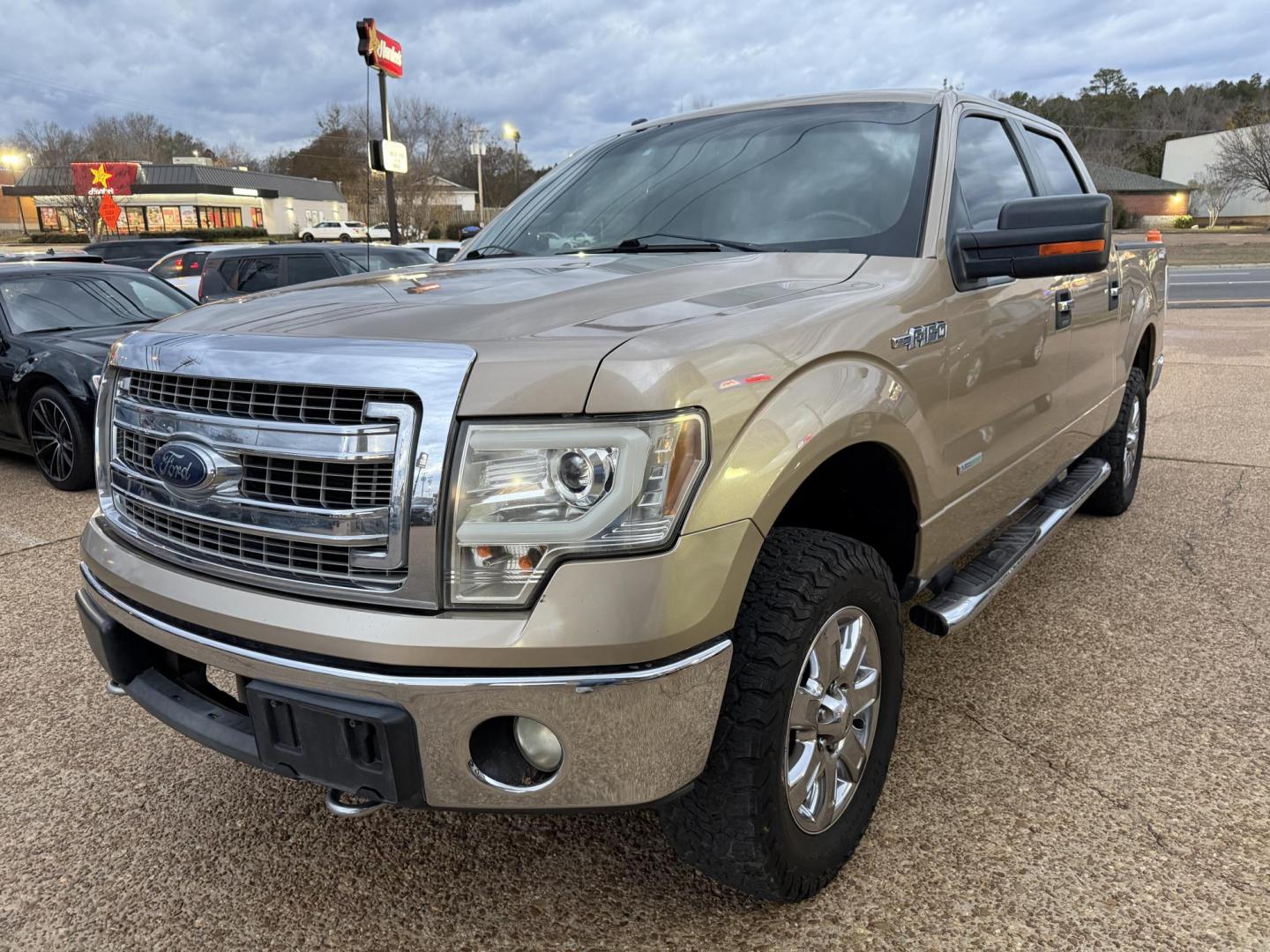 2013 TAN FORD F-150 XLT (1FTFW1ET7DK) , located at 922 W. Beacon St., Philadelphia, MS, 39350, (601) 650-3675, 32.770447, -89.127151 - Photo#2