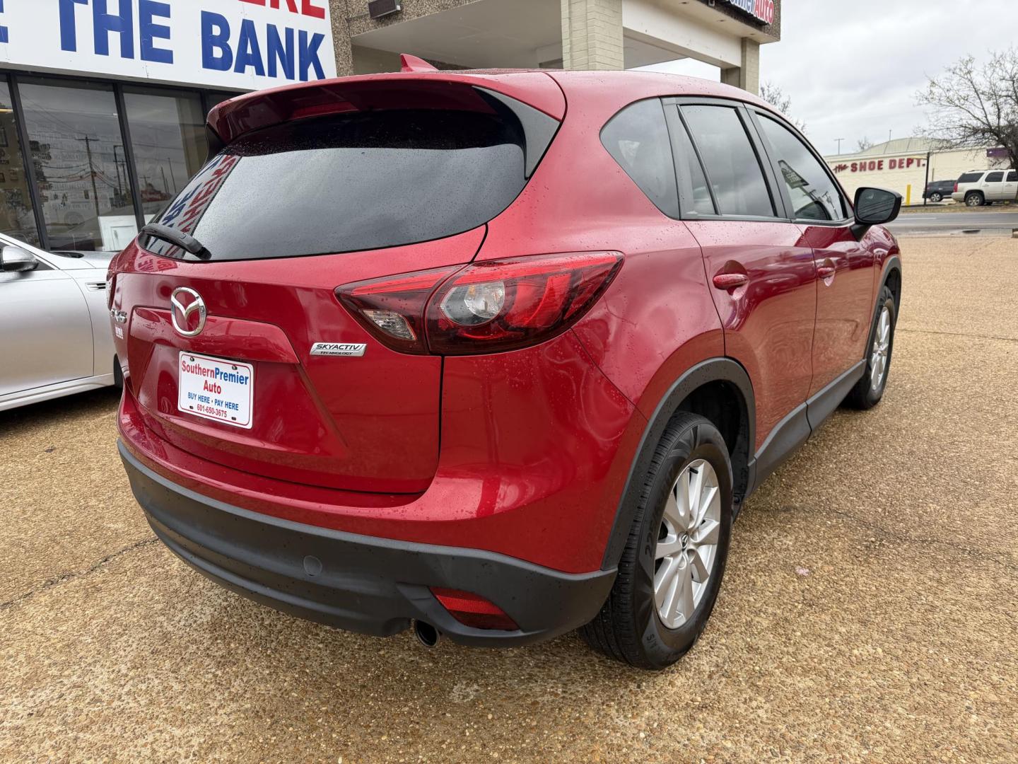 2016 RED MAZDA CX-5 TOURING (JM3KE2CY2G0) , located at 922 W. Beacon St., Philadelphia, MS, 39350, (601) 650-3675, 32.770447, -89.127151 - Photo#5
