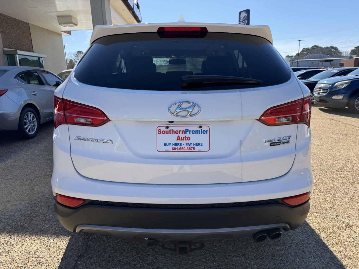 2016 WHITE HYUNDAI SANTA FE SPORT 2.0T (5XYZWDLA2GG) , located at 922 W. Beacon St., Philadelphia, MS, 39350, (601) 650-3675, 32.770447, -89.127151 - Photo#4