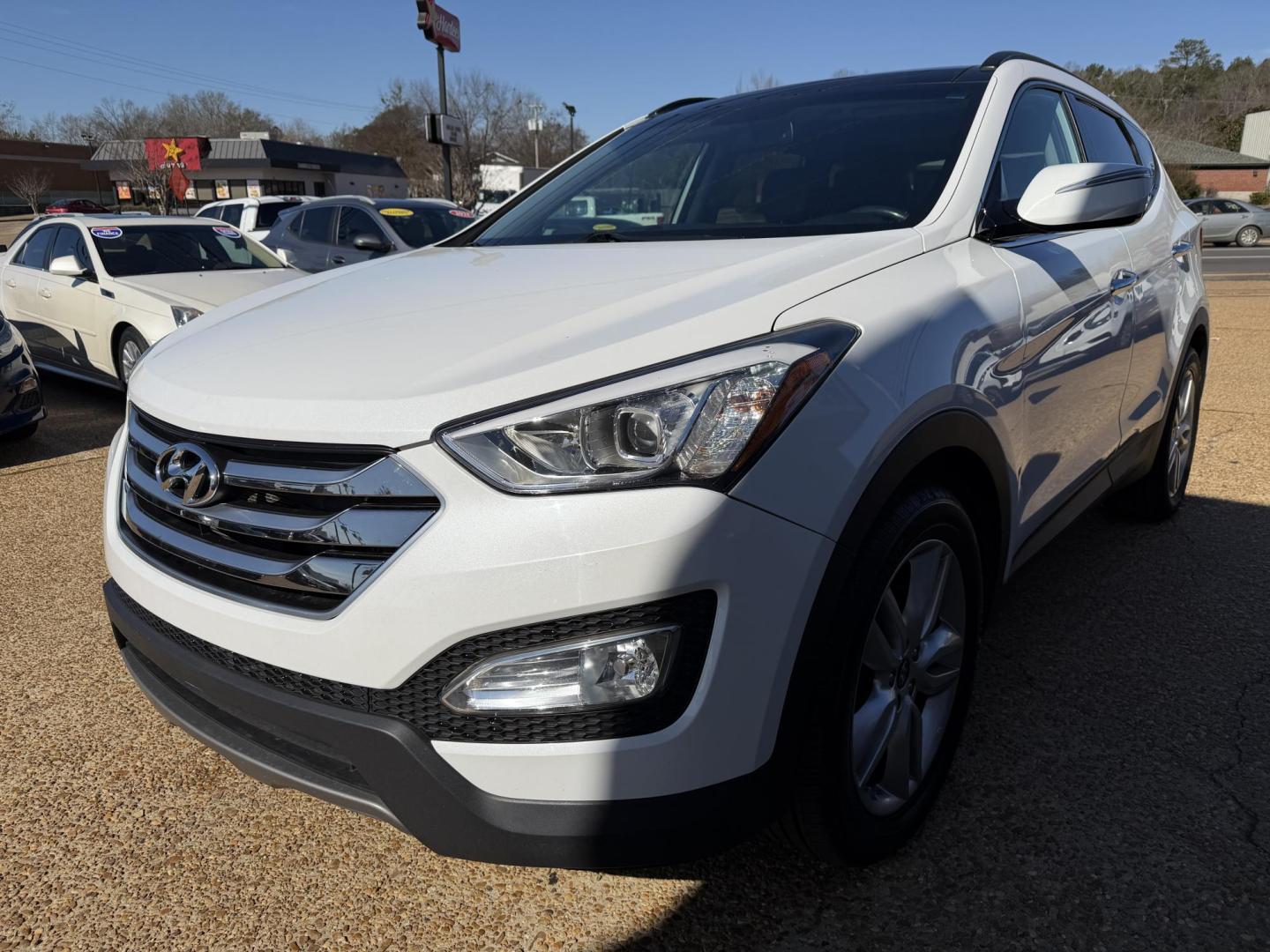 2016 WHITE HYUNDAI SANTA FE SPORT 2.0T (5XYZWDLA2GG) , located at 922 W. Beacon St., Philadelphia, MS, 39350, (601) 650-3675, 32.770447, -89.127151 - Photo#2