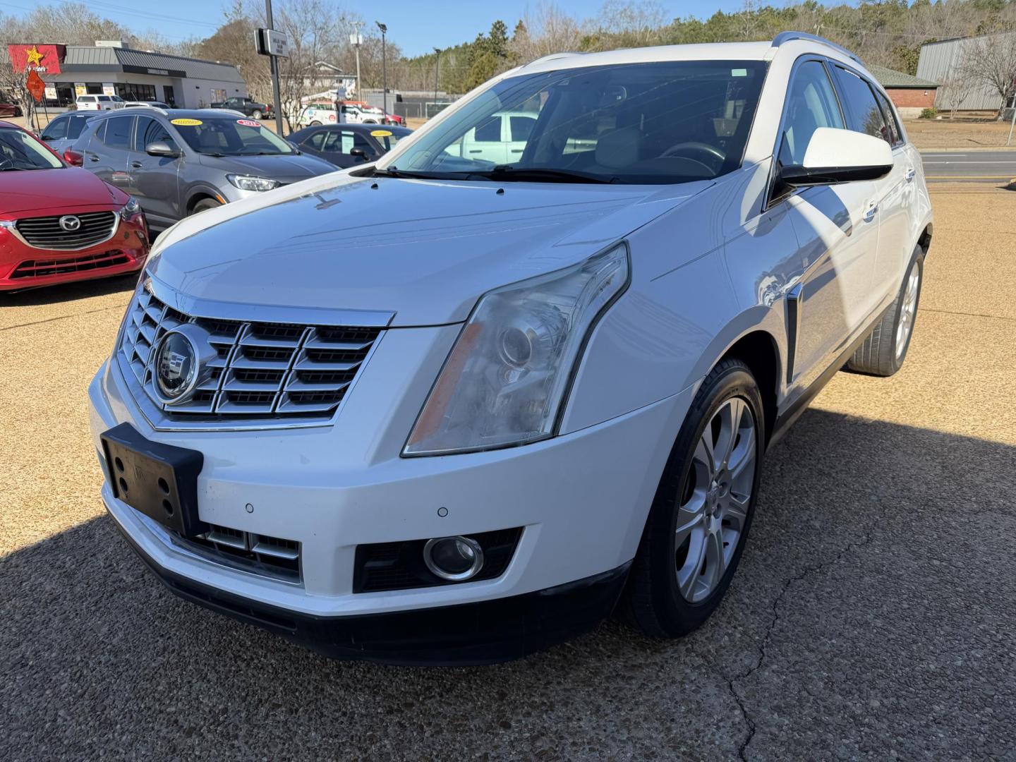 2016 WHITE CADILLAC SRX PREMIUM (3GYFNDE3XGS) , located at 922 W. Beacon St., Philadelphia, MS, 39350, (601) 650-3675, 32.770447, -89.127151 - Photo#2