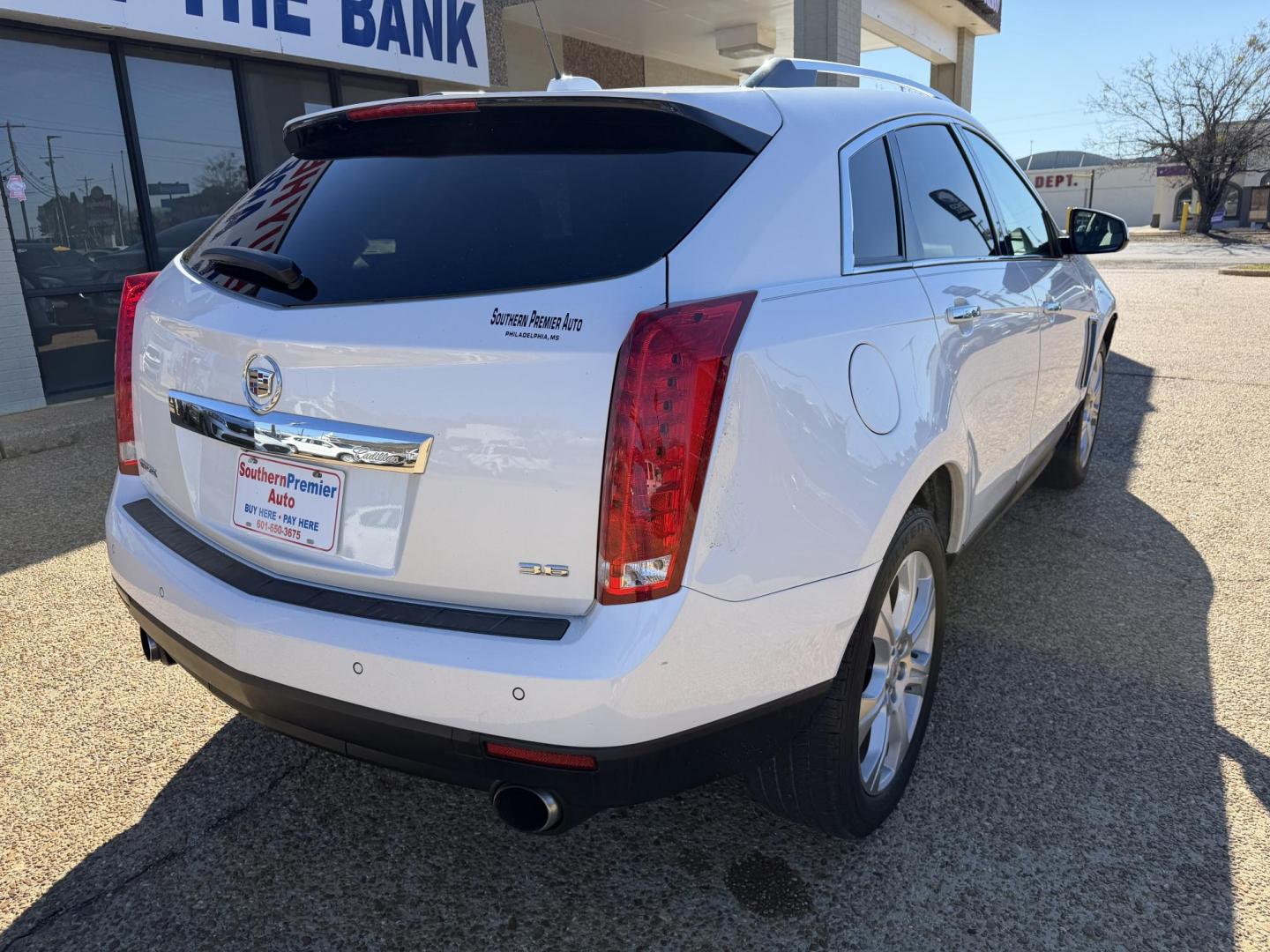 2016 WHITE CADILLAC SRX PREMIUM (3GYFNDE3XGS) , located at 922 W. Beacon St., Philadelphia, MS, 39350, (601) 650-3675, 32.770447, -89.127151- Photo#5
