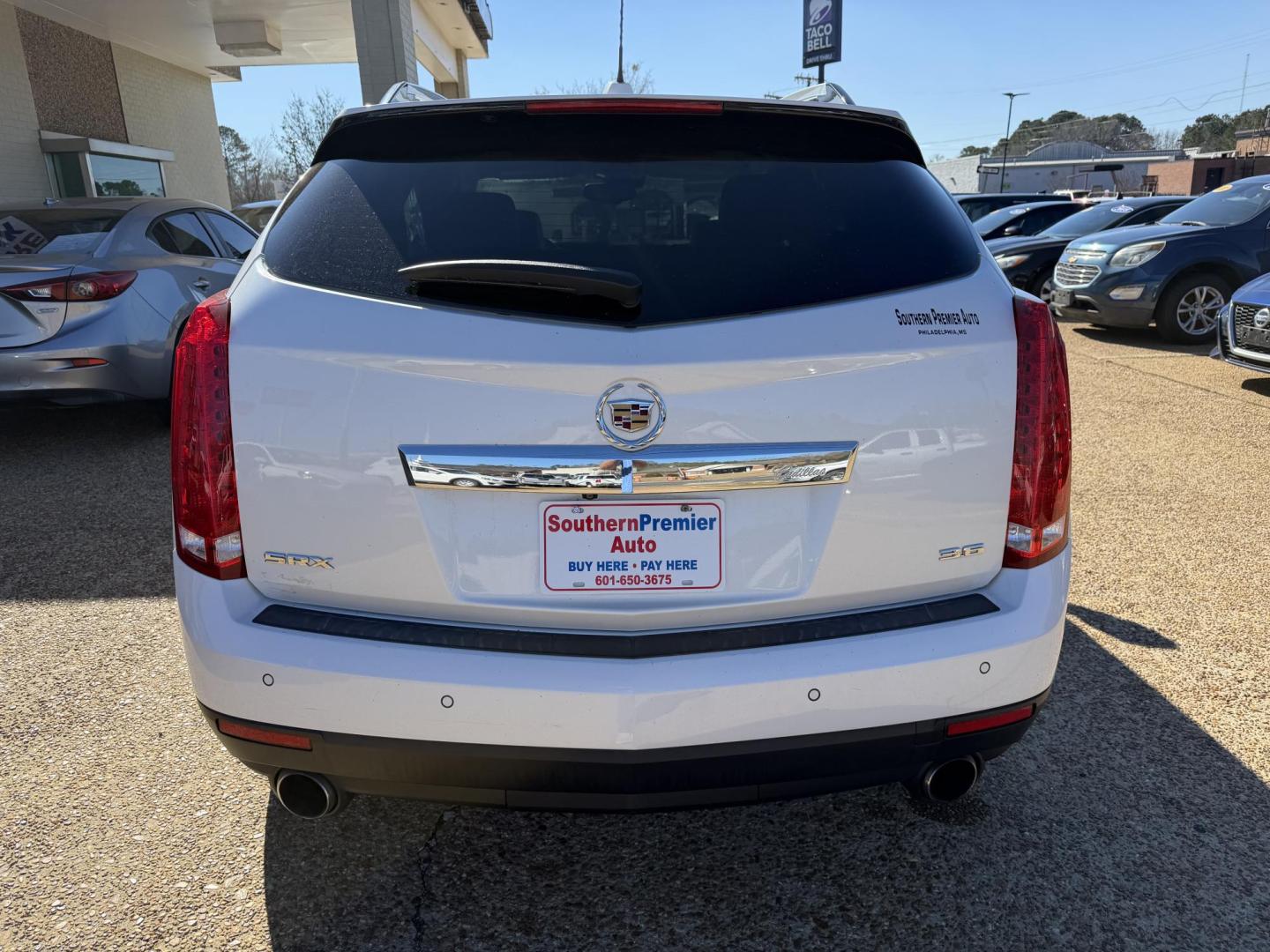 2016 WHITE CADILLAC SRX PREMIUM (3GYFNDE3XGS) , located at 922 W. Beacon St., Philadelphia, MS, 39350, (601) 650-3675, 32.770447, -89.127151 - Photo#4