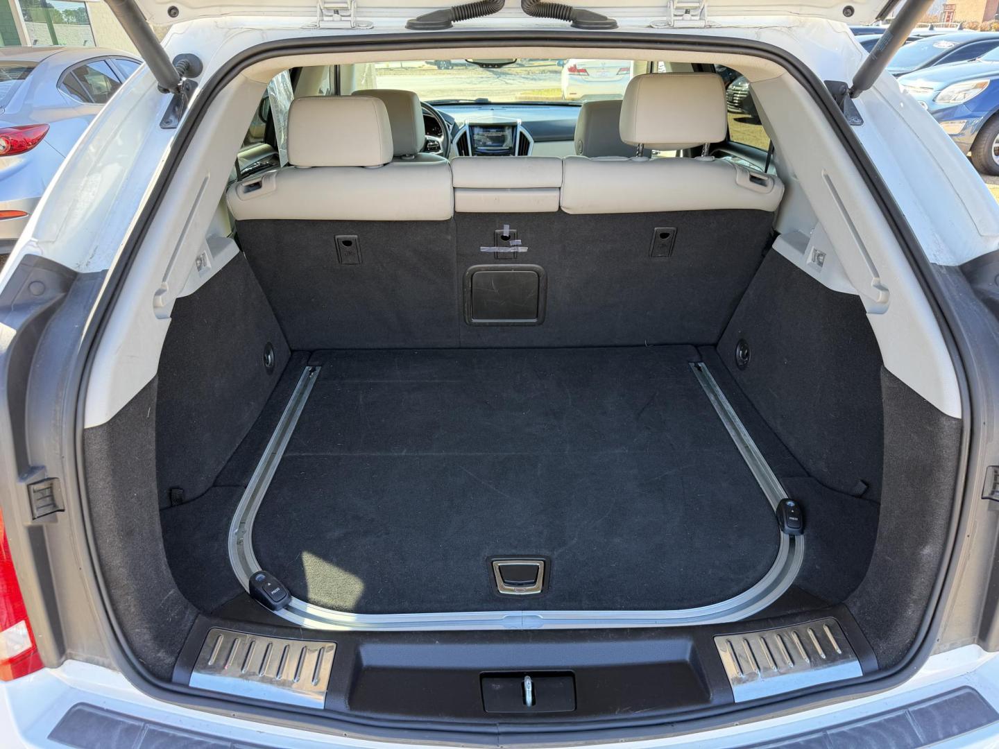 2016 WHITE CADILLAC SRX PREMIUM (3GYFNDE3XGS) , located at 922 W. Beacon St., Philadelphia, MS, 39350, (601) 650-3675, 32.770447, -89.127151- Photo#19