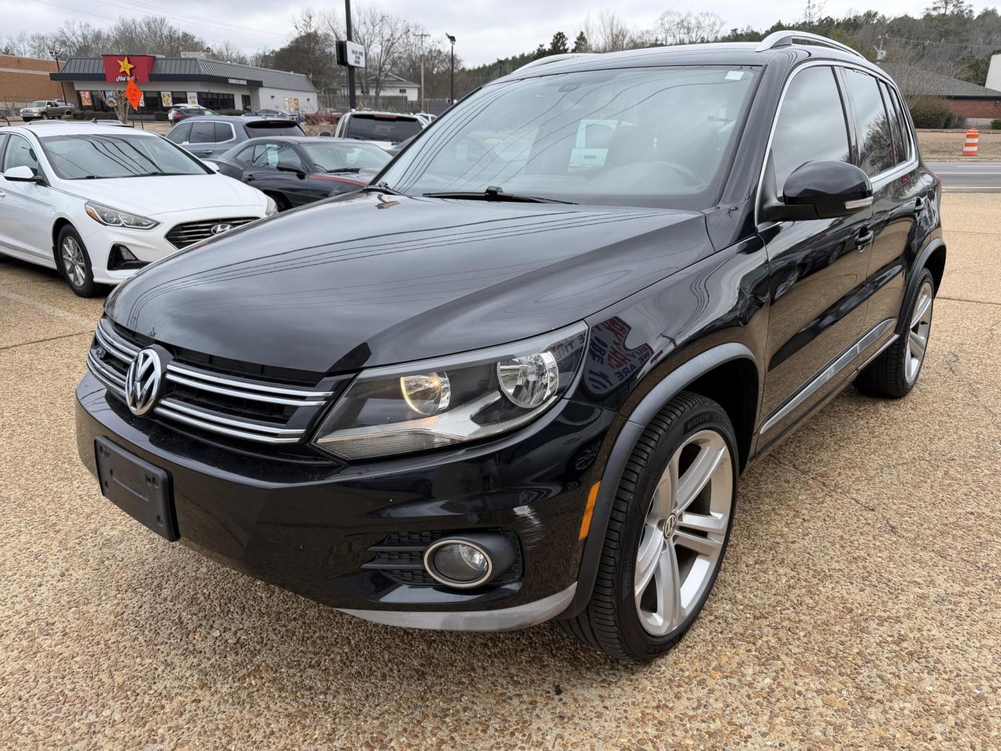 2016 BLACK VOLKSWAGEN TIGUAN R-LINE (WVGAV7AX6GW) , located at 922 W. Beacon St., Philadelphia, MS, 39350, (601) 650-3675, 32.770447, -89.127151 - Photo#2
