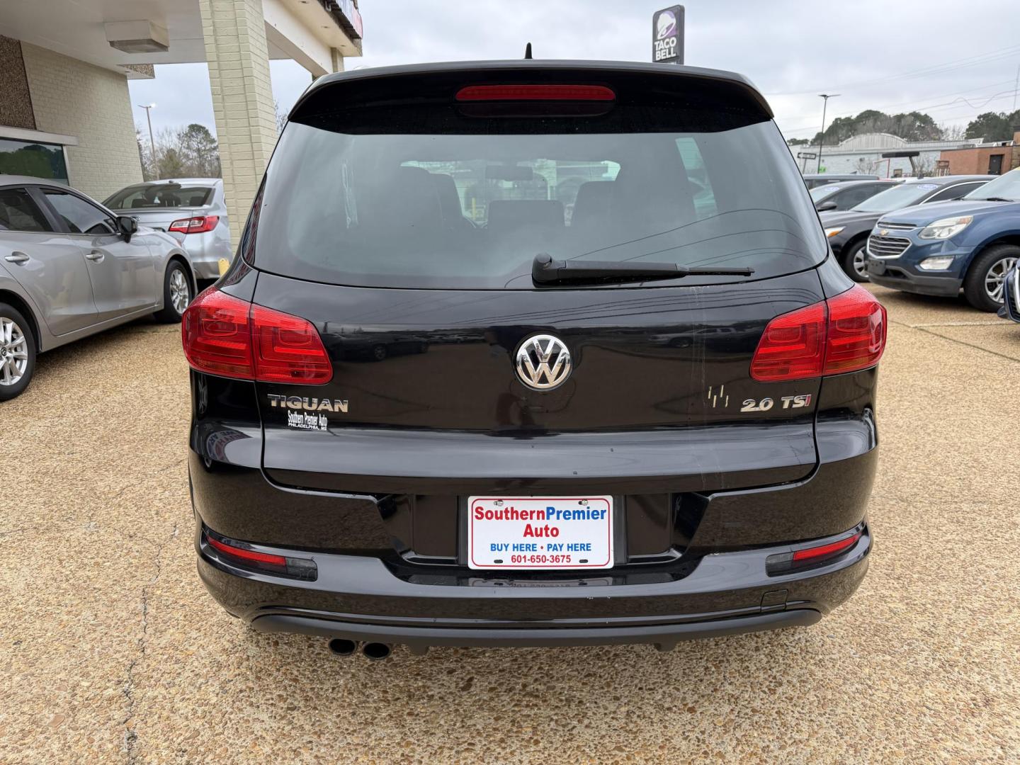 2016 BLACK VOLKSWAGEN TIGUAN R-LINE (WVGAV7AX6GW) , located at 922 W. Beacon St., Philadelphia, MS, 39350, (601) 650-3675, 32.770447, -89.127151 - Photo#4