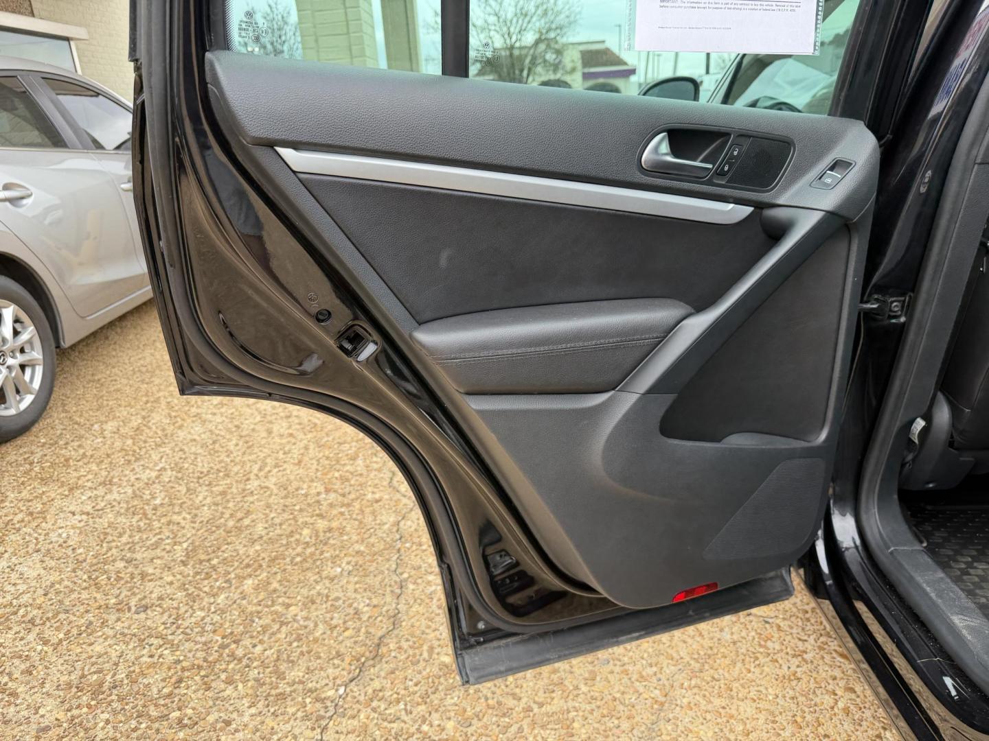 2016 BLACK VOLKSWAGEN TIGUAN R-LINE (WVGAV7AX6GW) , located at 922 W. Beacon St., Philadelphia, MS, 39350, (601) 650-3675, 32.770447, -89.127151 - Photo#12