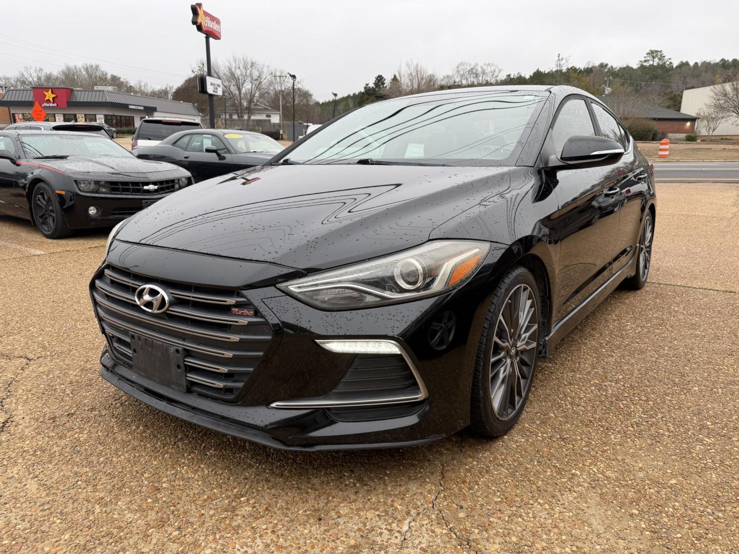 2018 BLACK HYUNDAI ELANTRA SPORT (KMHD04LB2JU) , located at 922 W. Beacon St., Philadelphia, MS, 39350, (601) 650-3675, 32.770447, -89.127151 - Photo#2