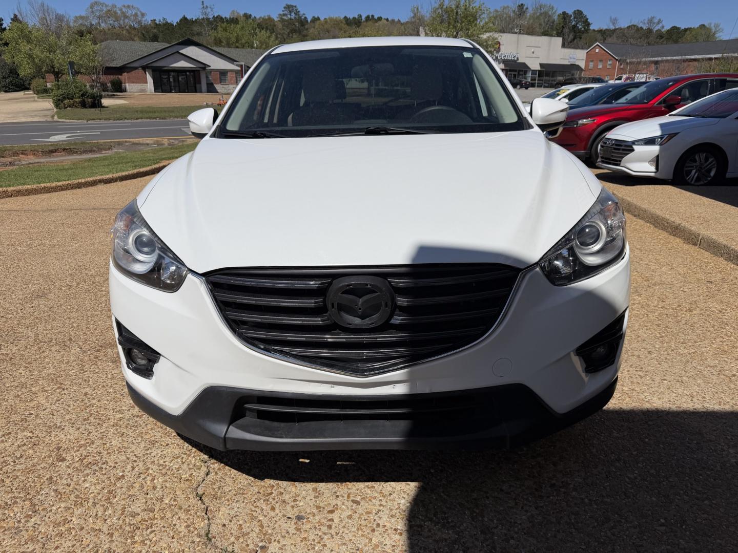 2016 WHITE MAZDA CX-5 TOURING (JM3KE2CY9G0) , located at 922 W. Beacon St., Philadelphia, MS, 39350, (601) 650-3675, 32.770447, -89.127151 - Photo#1