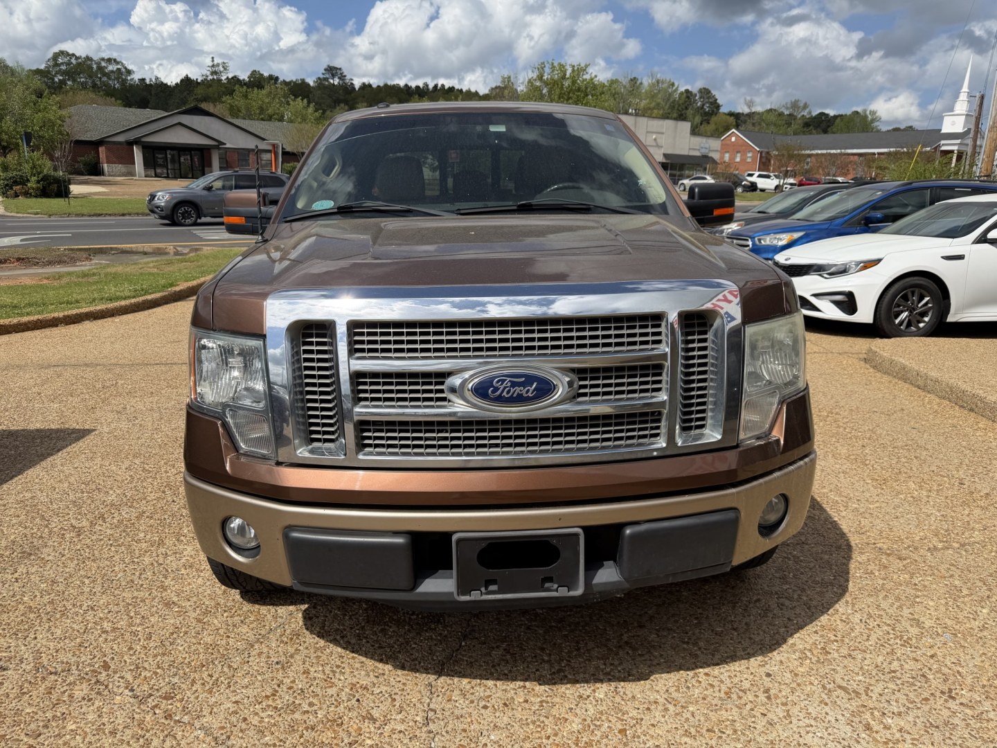 2011 BROWN FORD F-150 LARIAT (1FTFW1CF7BF) , located at 922 W. Beacon St., Philadelphia, MS, 39350, (601) 650-3675, 32.770447, -89.127151 - Photo#1