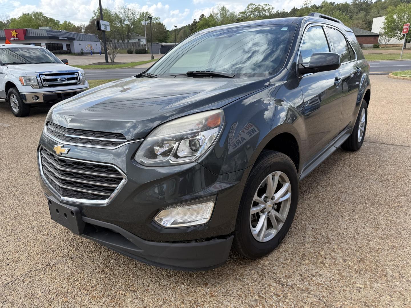 2017 GRAY CHEVROLET EQUINOX LT (2GNALCEKXH1) , located at 922 W. Beacon St., Philadelphia, MS, 39350, (601) 650-3675, 32.770447, -89.127151- Photo#2