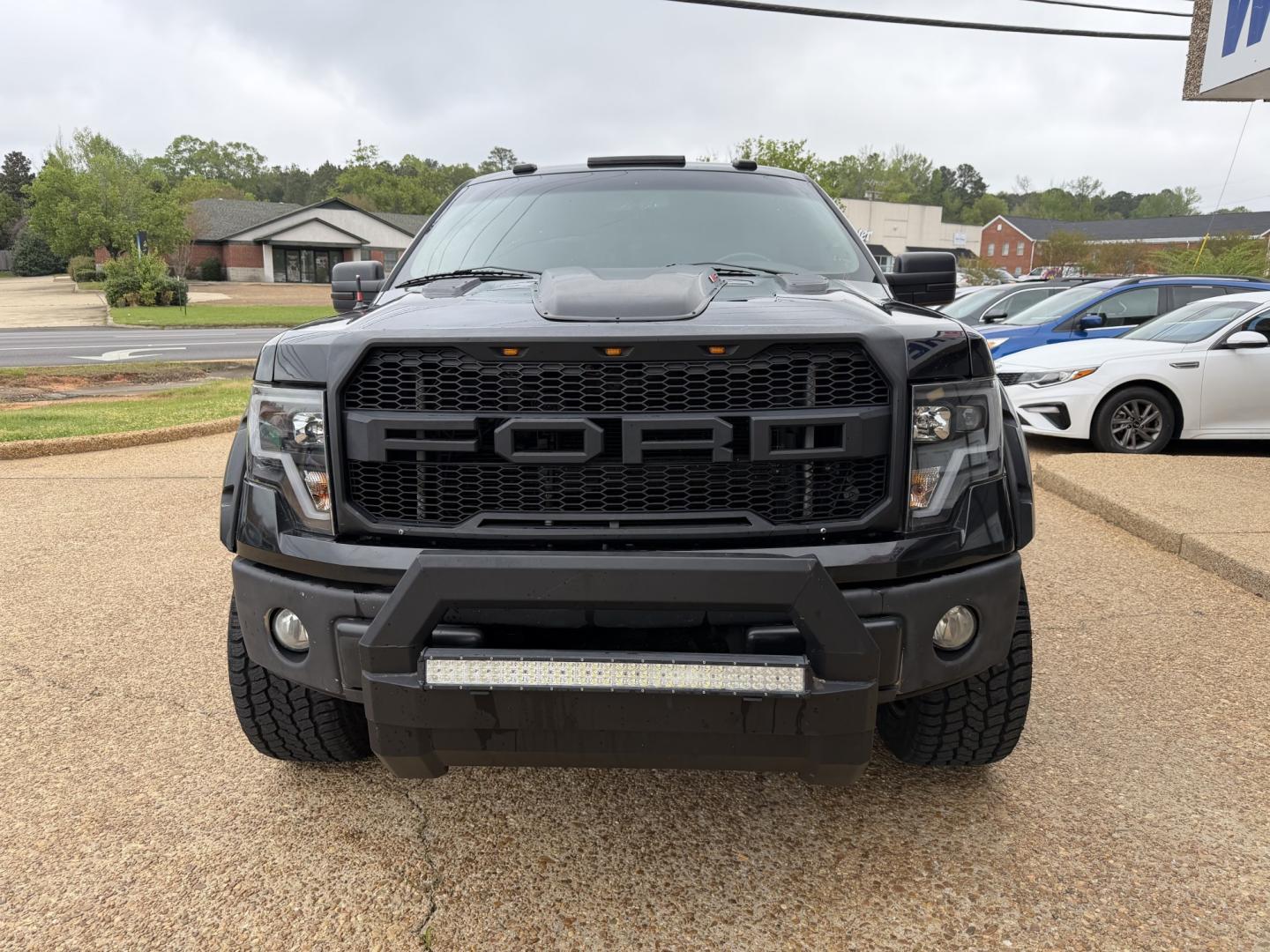 2013 BLACK FORD F-150 XLT (1FTFW1EF3DK) , located at 922 W. Beacon St., Philadelphia, MS, 39350, (601) 650-3675, 32.770447, -89.127151 - Photo#1