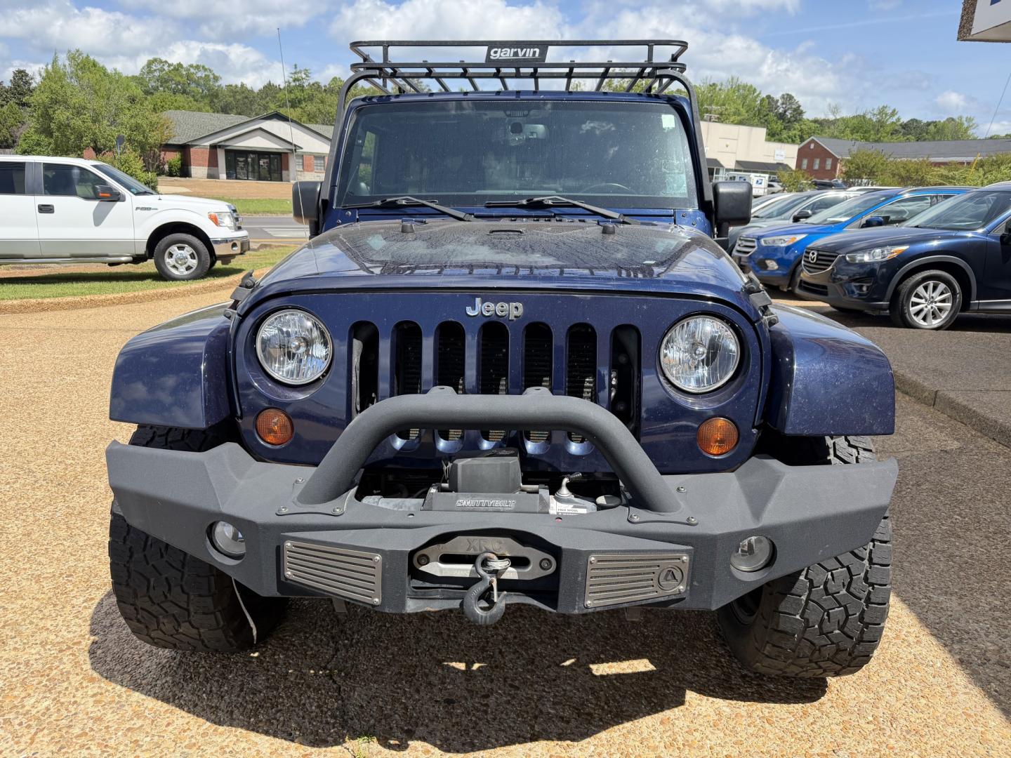 2013 BLUE JEEP WRANGLER UNLIMITED S (1C4HJWEG6DL) , located at 922 W. Beacon St., Philadelphia, MS, 39350, (601) 650-3675, 32.770447, -89.127151 - Photo#1
