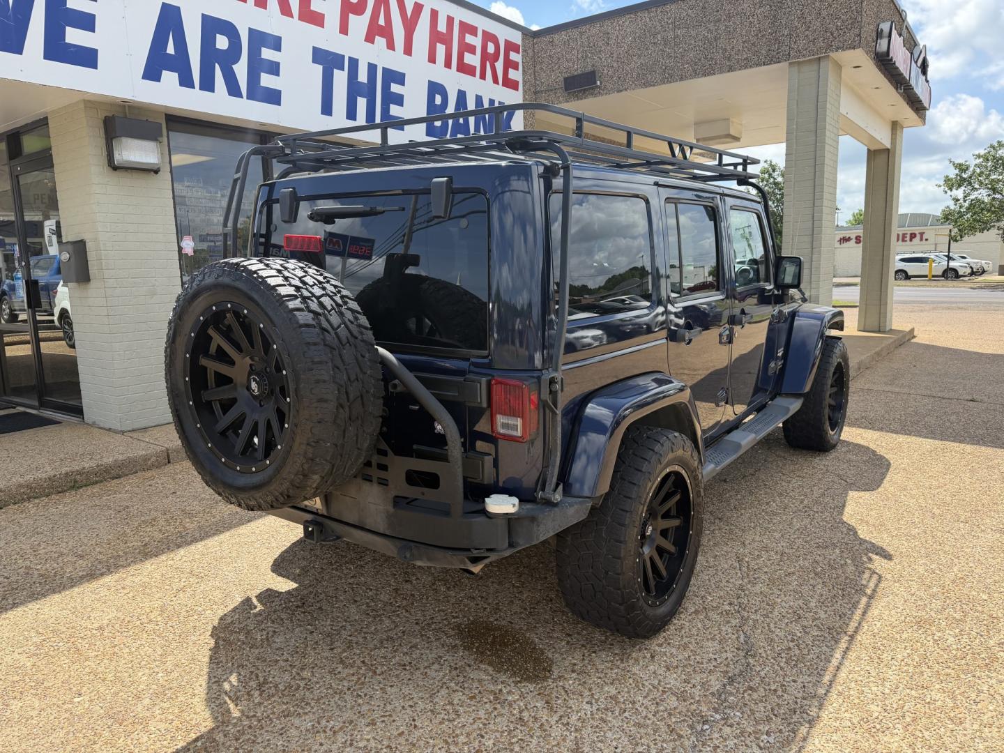 2013 BLUE JEEP WRANGLER UNLIMITED S (1C4HJWEG6DL) , located at 922 W. Beacon St., Philadelphia, MS, 39350, (601) 650-3675, 32.770447, -89.127151 - Photo#5