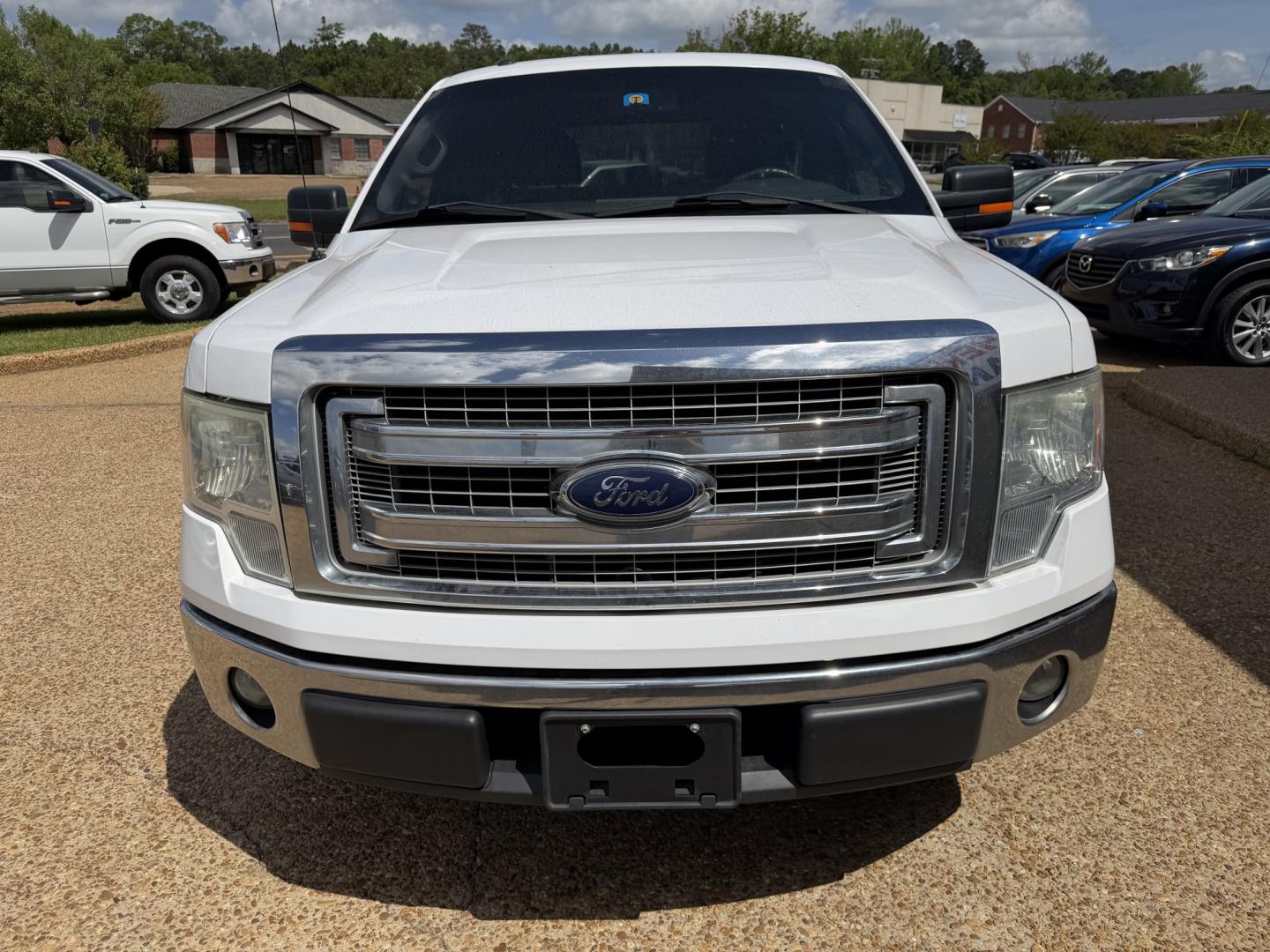 2014 WHITE FORD F-150 XLT (1FTFW1CF0EK) , located at 922 W. Beacon St., Philadelphia, MS, 39350, (601) 650-3675, 32.770447, -89.127151- Photo#1