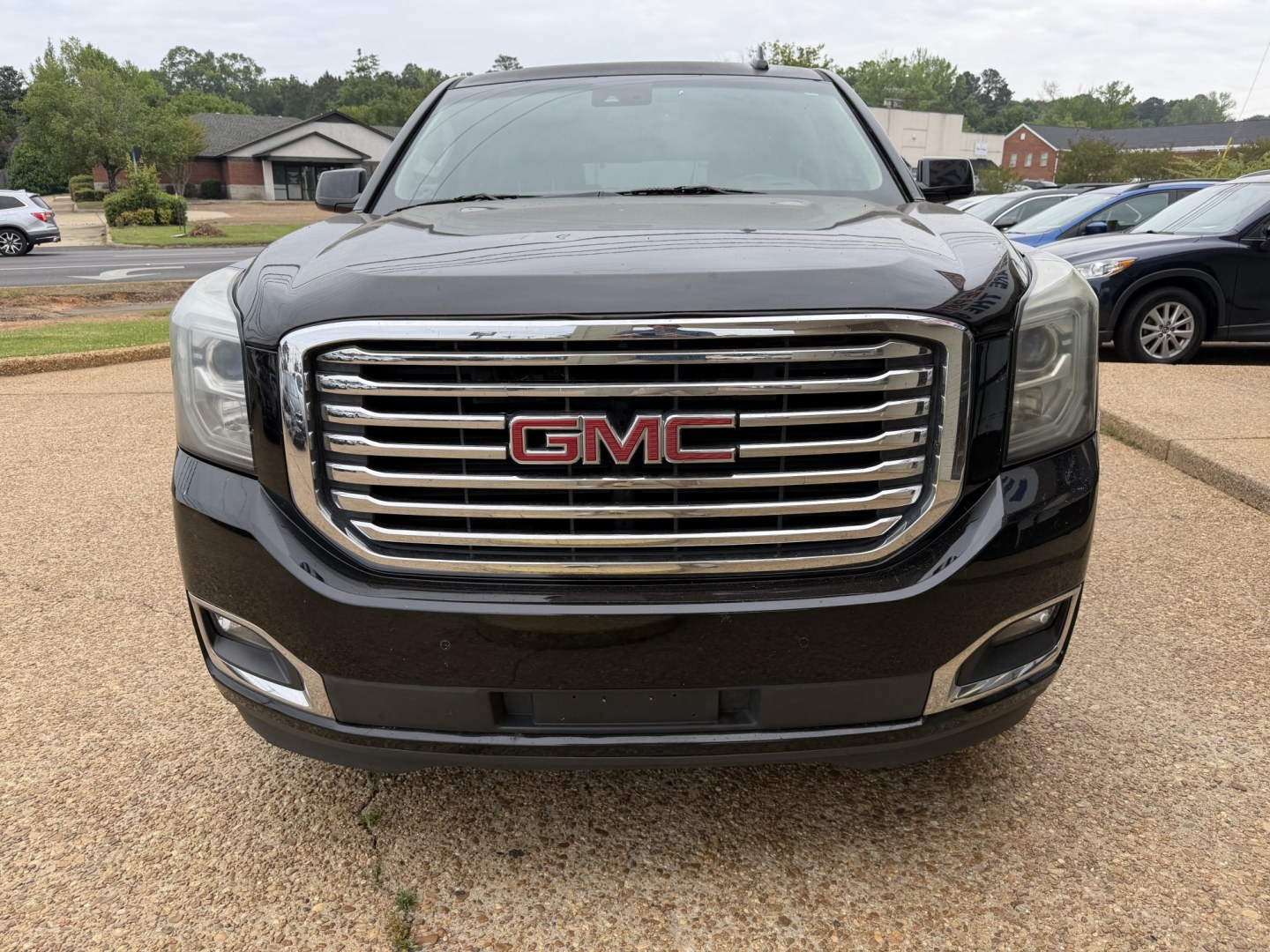 2017 BLACK GMC YUKON XL SLT (1GKS1GKC4HR) , located at 922 W. Beacon St., Philadelphia, MS, 39350, (601) 650-3675, 32.770447, -89.127151 - Photo#1