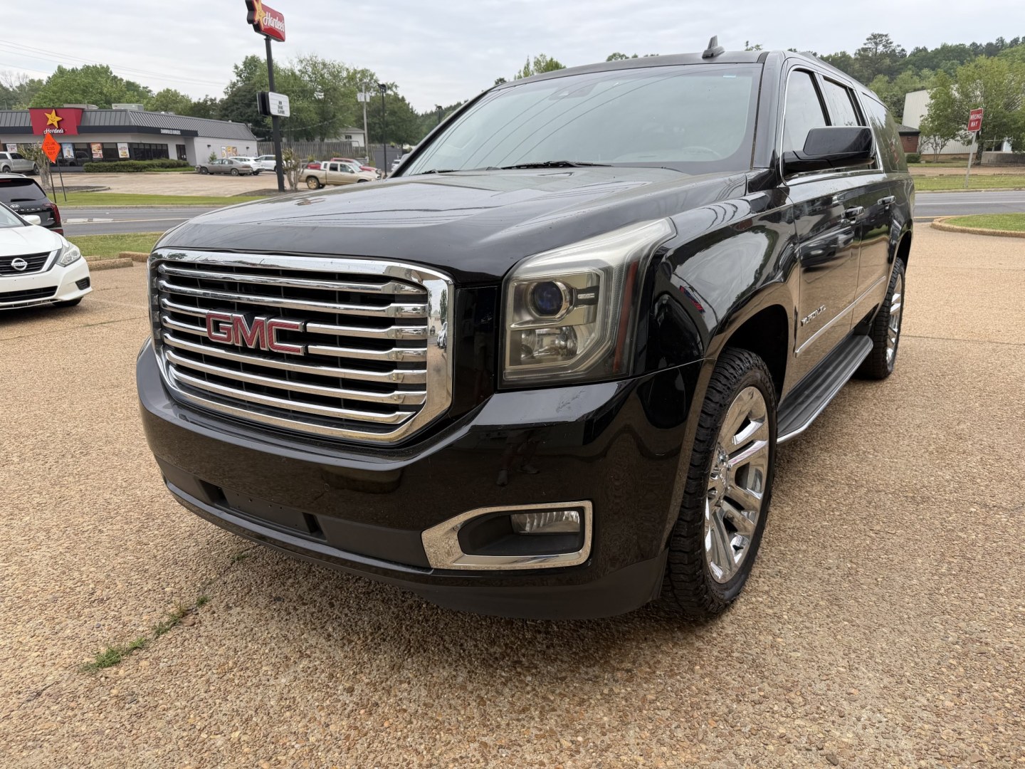 2017 BLACK GMC YUKON XL SLT (1GKS1GKC4HR) , located at 922 W. Beacon St., Philadelphia, MS, 39350, (601) 650-3675, 32.770447, -89.127151 - Photo#2