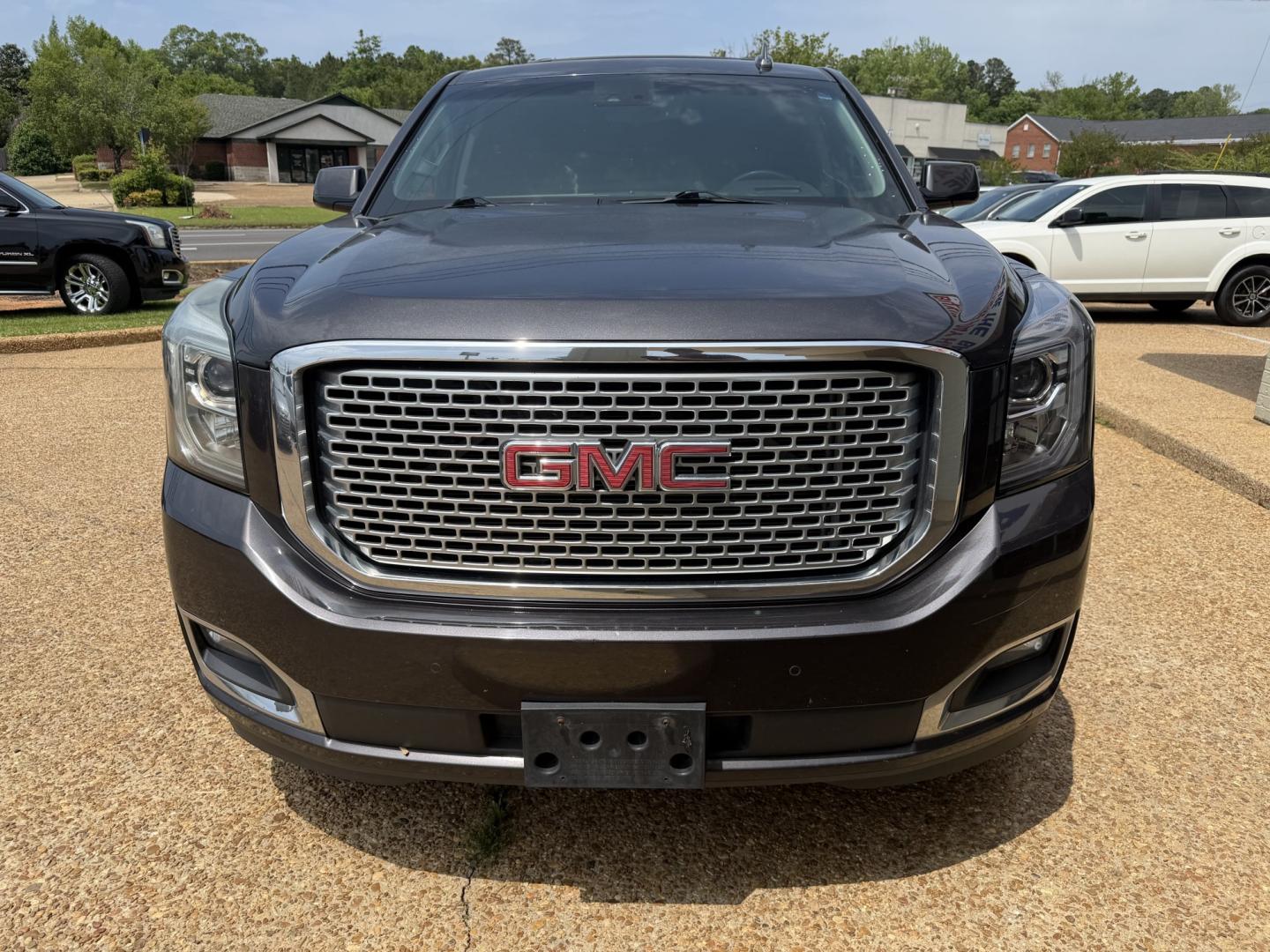 2016 GRAY GMC YUKON DENALI (1GKS2CKJ9GR) , located at 922 W. Beacon St., Philadelphia, MS, 39350, (601) 650-3675, 32.770447, -89.127151 - Photo#1