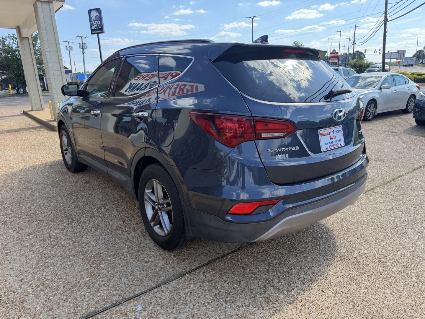 2017 BLUE HYUNDAI SANTA FE SPORT (5NMZU3LB4HH) , located at 922 W. Beacon St., Philadelphia, MS, 39350, (601) 650-3675, 32.770447, -89.127151- Photo#3