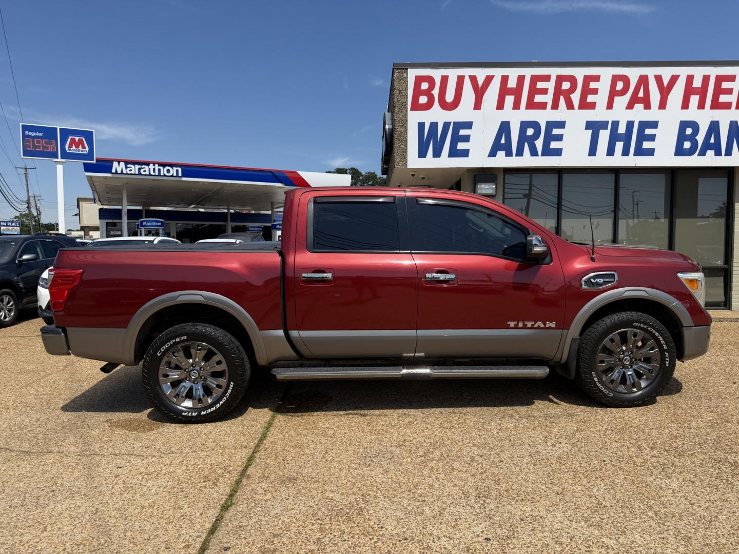 2017 RED NISSAN TITAN PLATINUM SV (1N6AA1E55HN) with an 5.6L 8CYL engine, located at 922 W. Beacon St., Philadelphia, MS, 39350, (601) 650-3675, 32.770447, -89.127151 - Photo#6