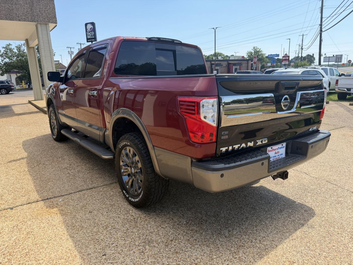 2017 RED NISSAN TITAN PLATINUM SV (1N6AA1E55HN) with an 5.6L 8CYL engine, located at 922 W. Beacon St., Philadelphia, MS, 39350, (601) 650-3675, 32.770447, -89.127151 - Photo#3