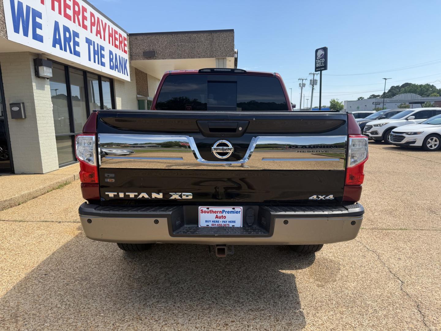 2017 RED NISSAN TITAN PLATINUM SV (1N6AA1E55HN) with an 5.6L 8CYL engine, located at 922 W. Beacon St., Philadelphia, MS, 39350, (601) 650-3675, 32.770447, -89.127151 - Photo#4